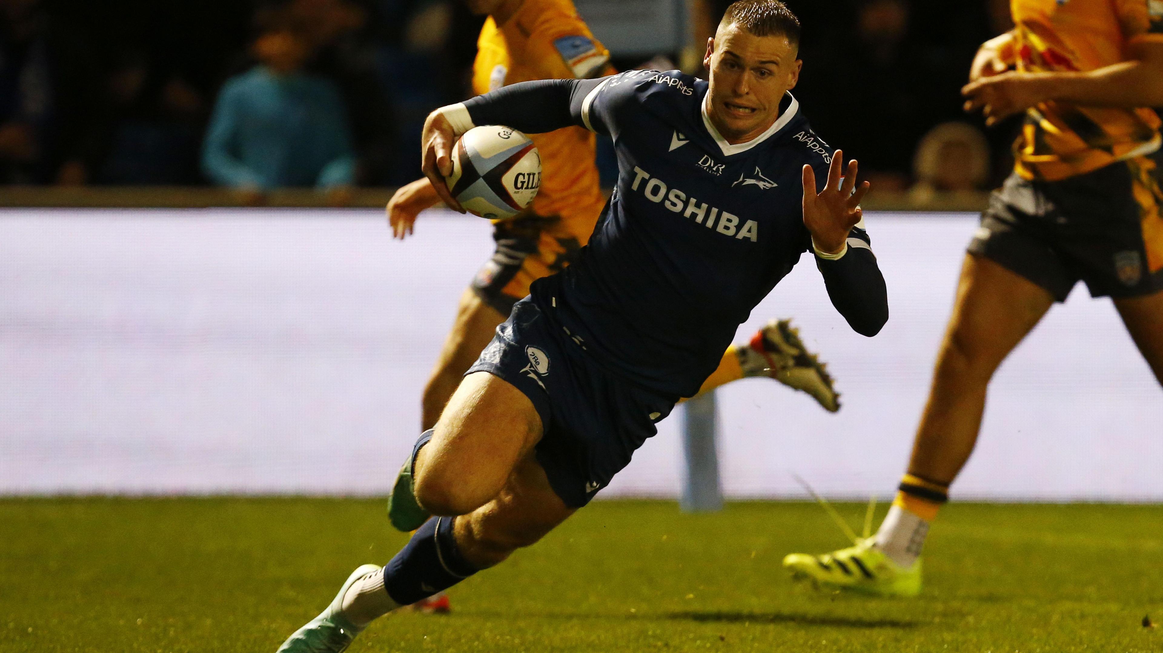 Sale Sharks' Tom Roebuck goes over the line for the first of his tries against Newcastle Falcons