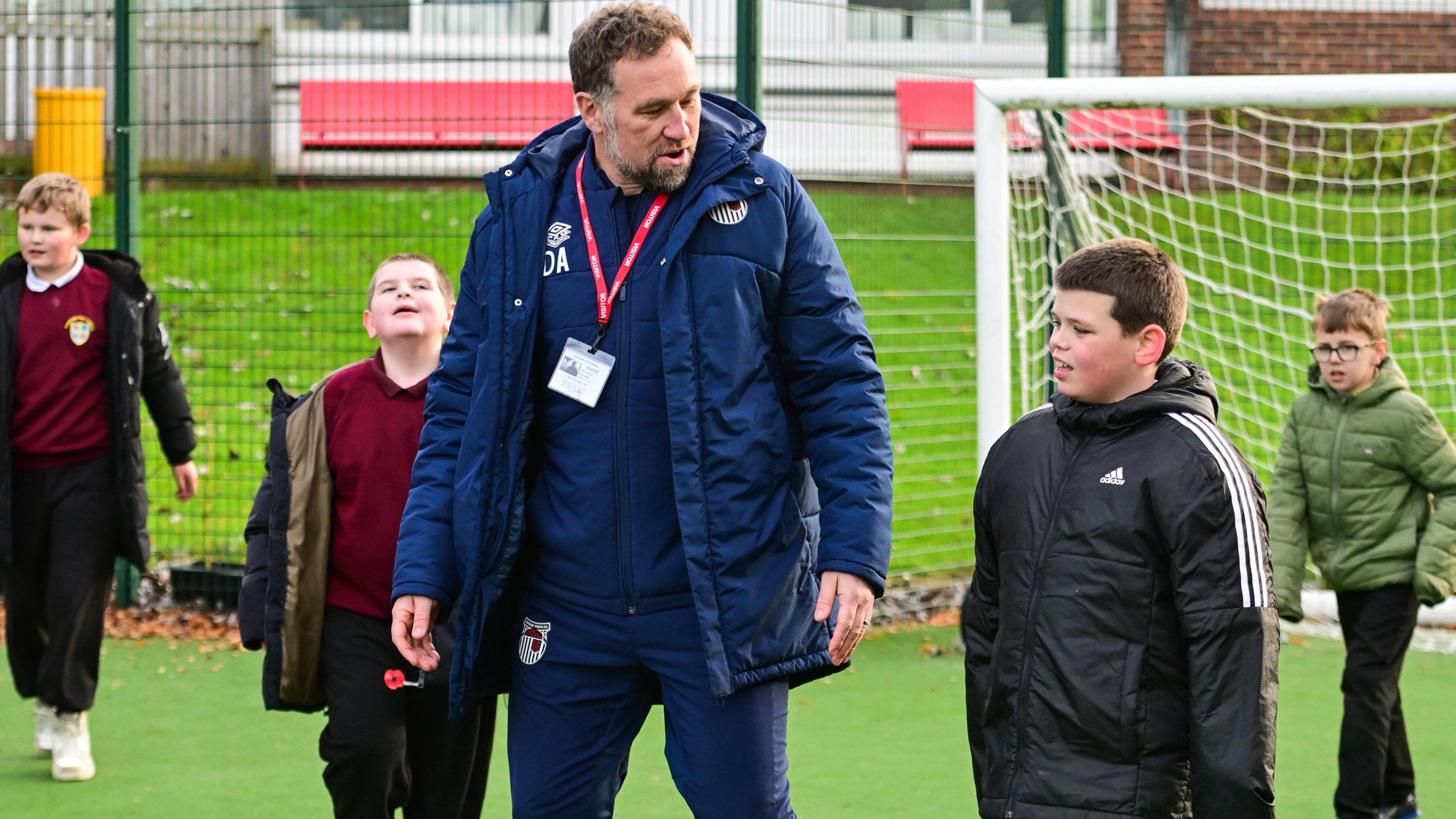 Grimsby boss David Artell gets involved in a youth session as part of the EFL Week of Action