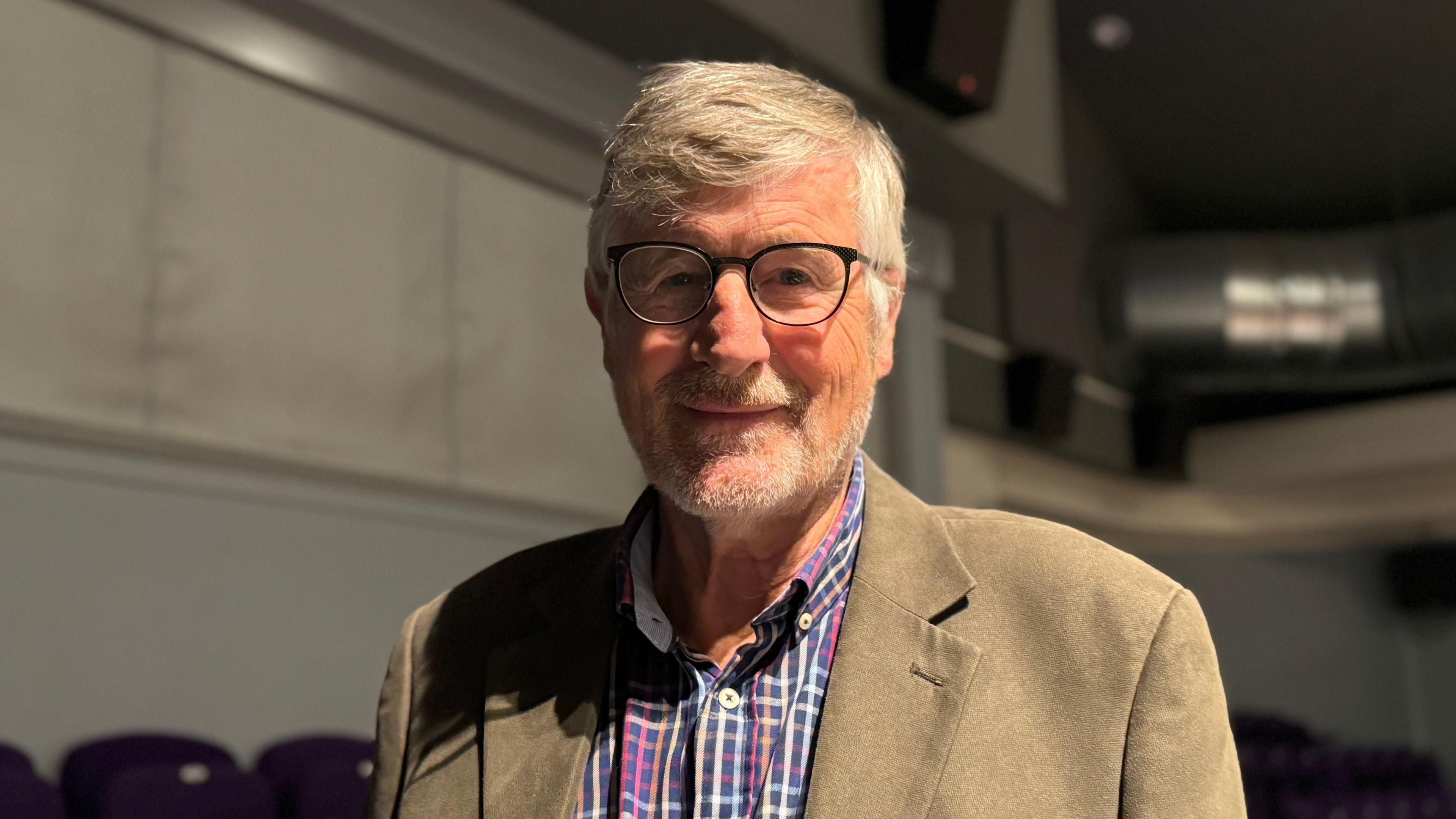 Councillor Nick Wright, the Cabinet member for Leisure and Community Assets at Mole Valley District Council, looks straight at the camera.