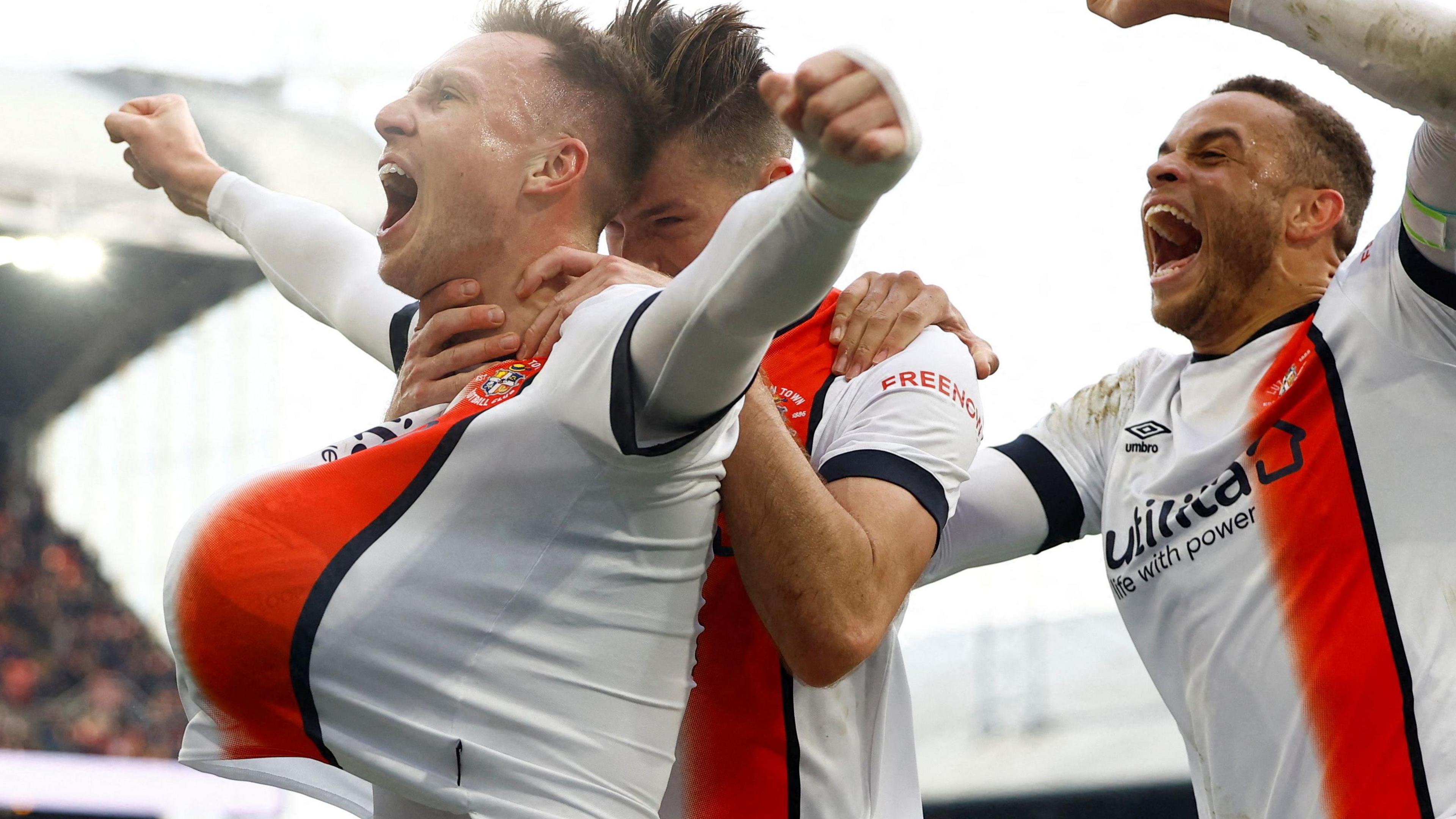 Luton players celebrate a goal at Crystal Palace