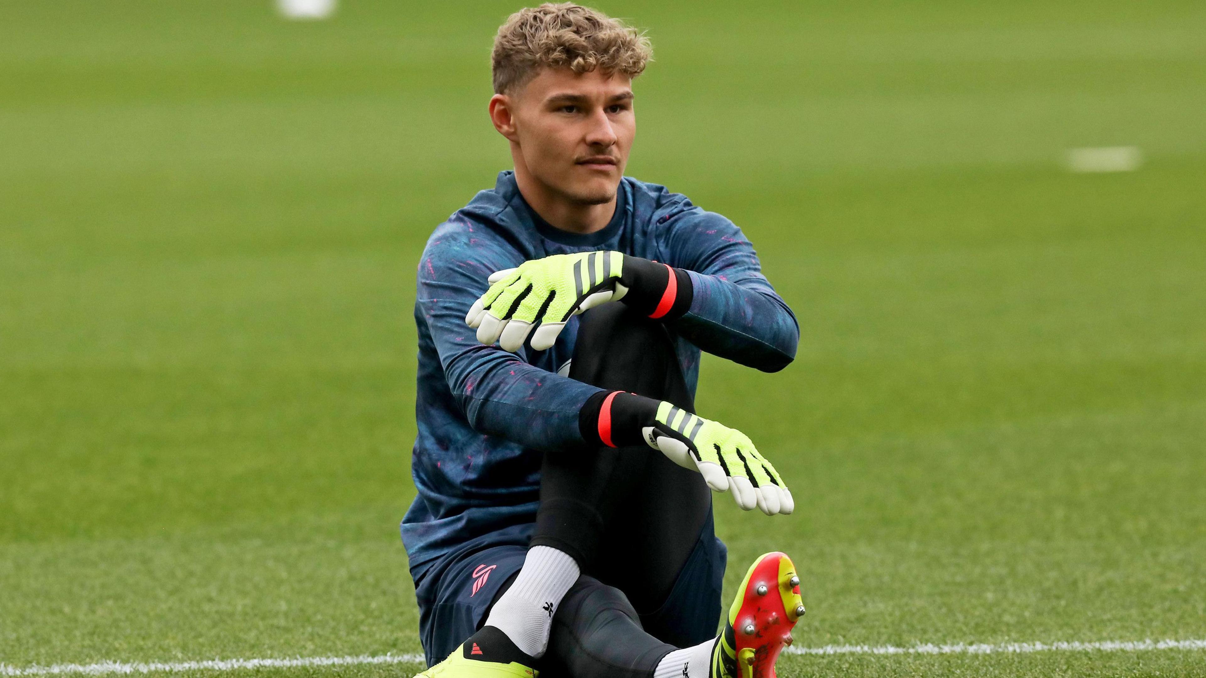 Swansea goalkeeper Carl Rushworth warms up before a game