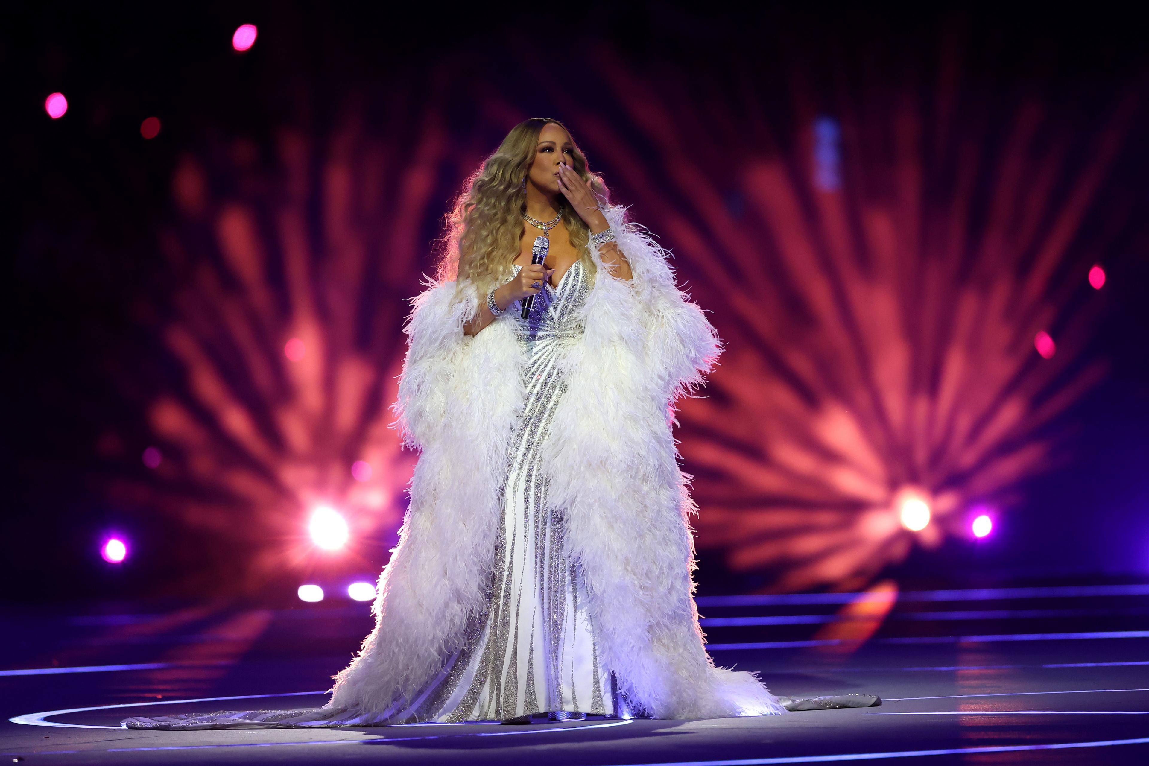 Mariah Carey performs during the opening ceremony
