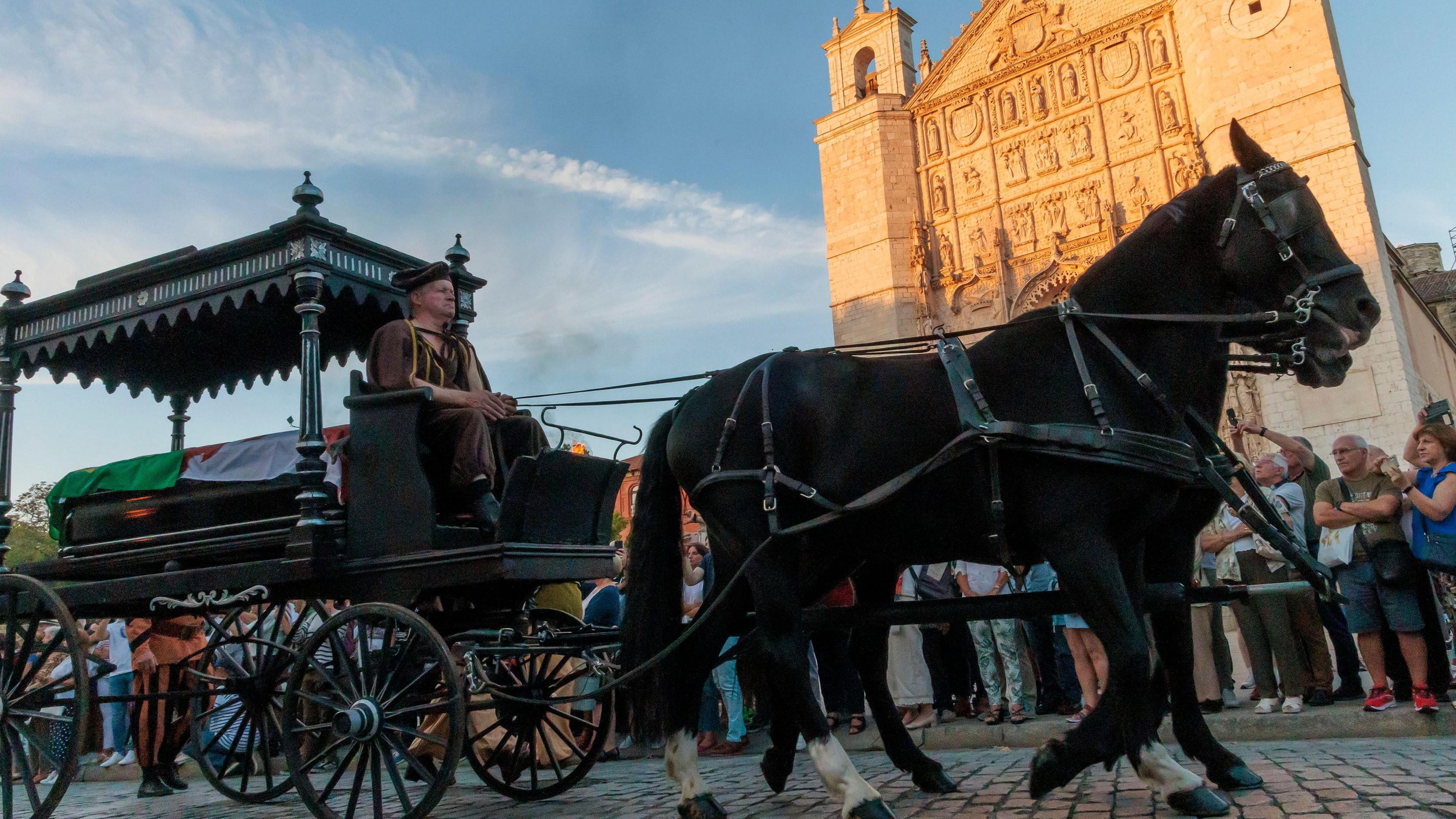 A horse-drawn carriage led the coffin through Valladolid