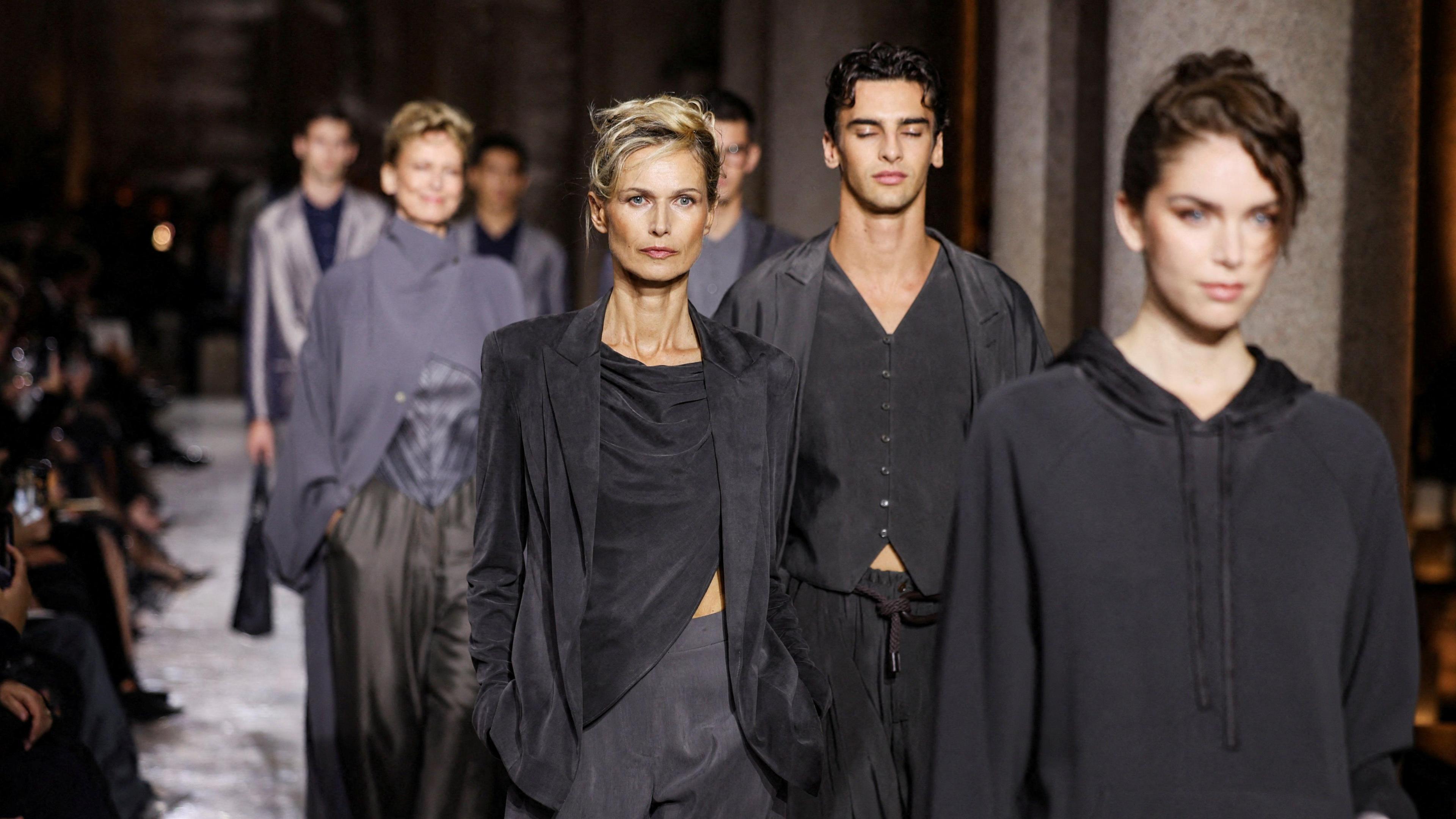 Models present creations from the Giorgio Armani Spring/Summer 2026 collection during Fashion Week in Milan, Italy, September 28, 2025.