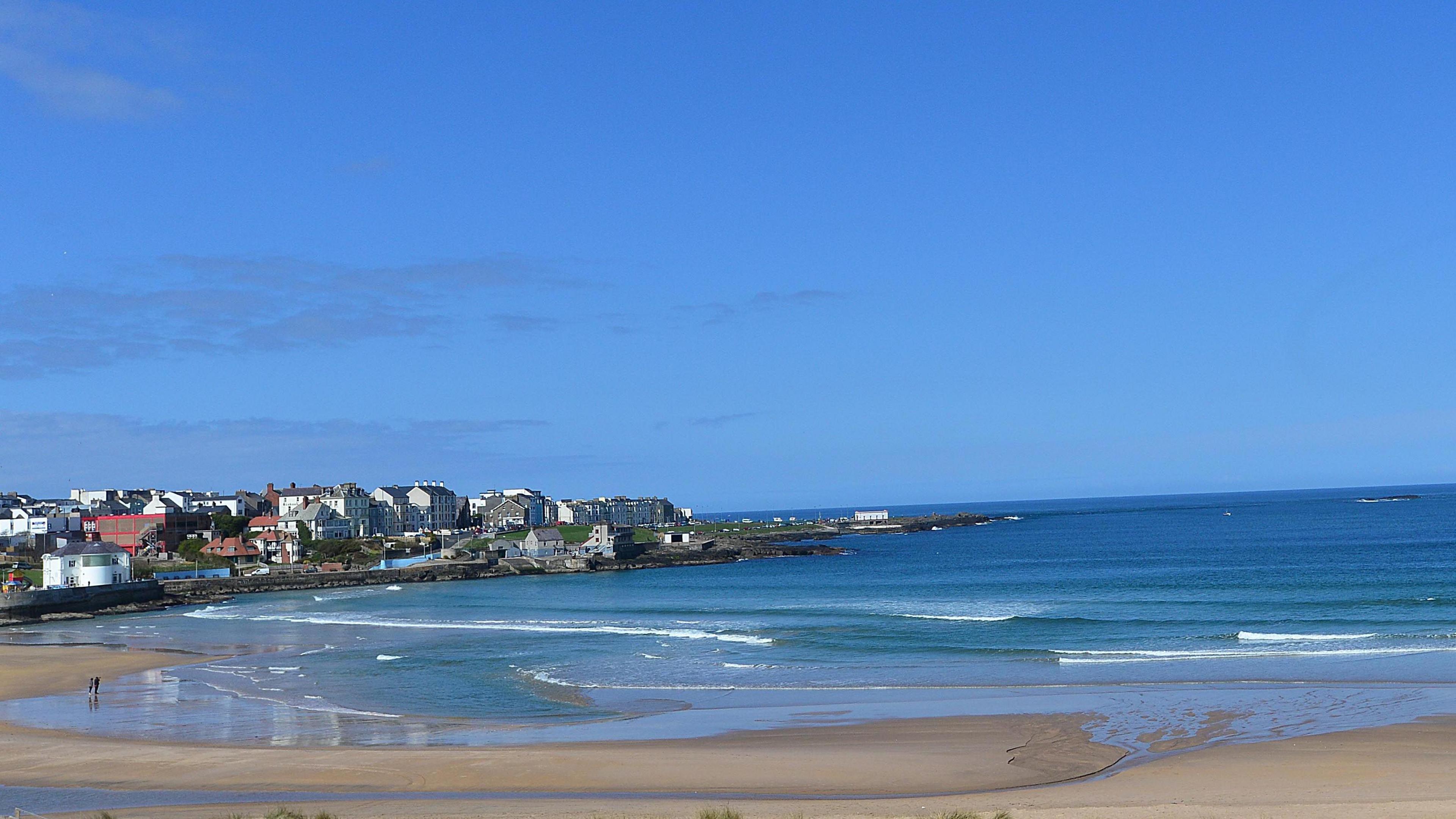 East Strand beach in Portrush on a sunny day.