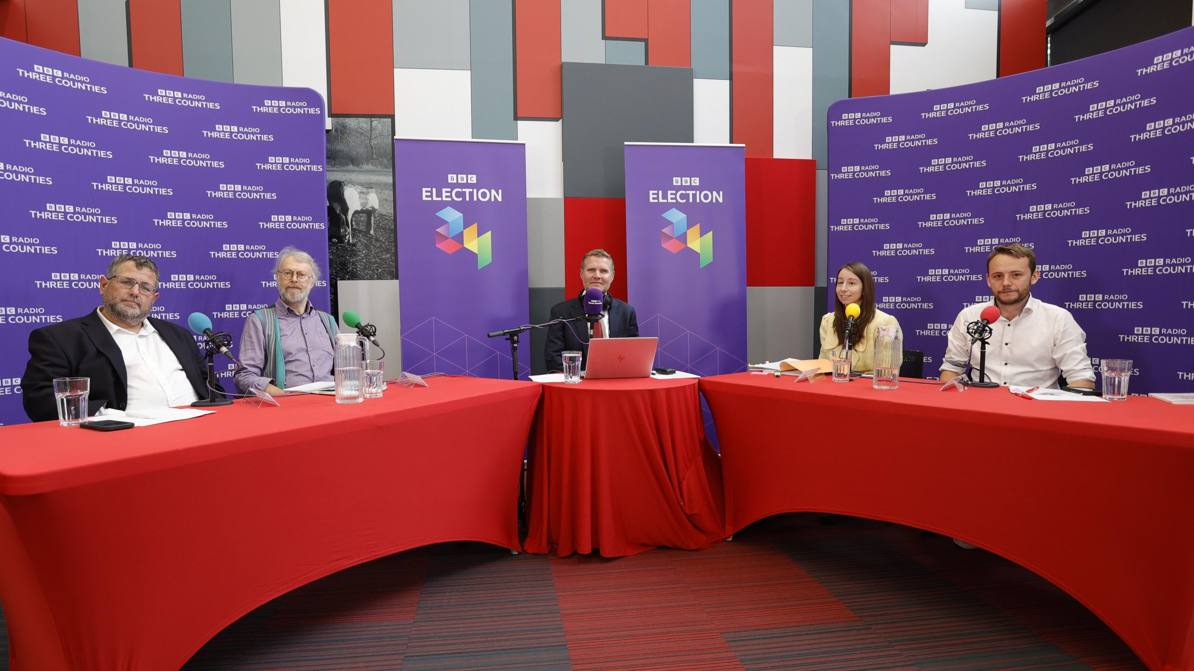 A picture of four of the five candidates in the Milton Keynes North debate plus presenter Jonathan Vernon-Smith