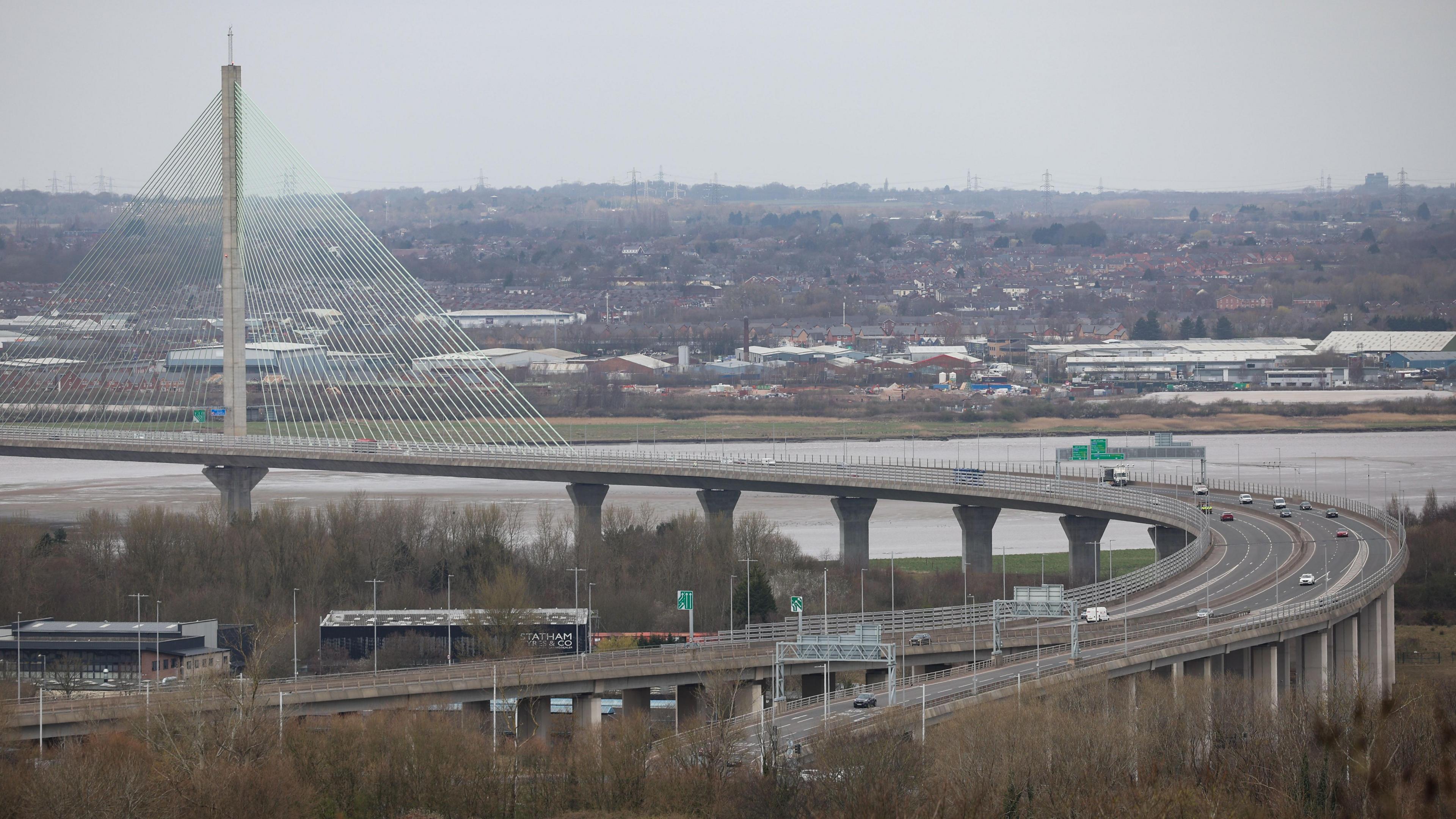 The Mersey Gateway Bridge in Runcorn is a long bridge supported by concrete pillars and steel cables