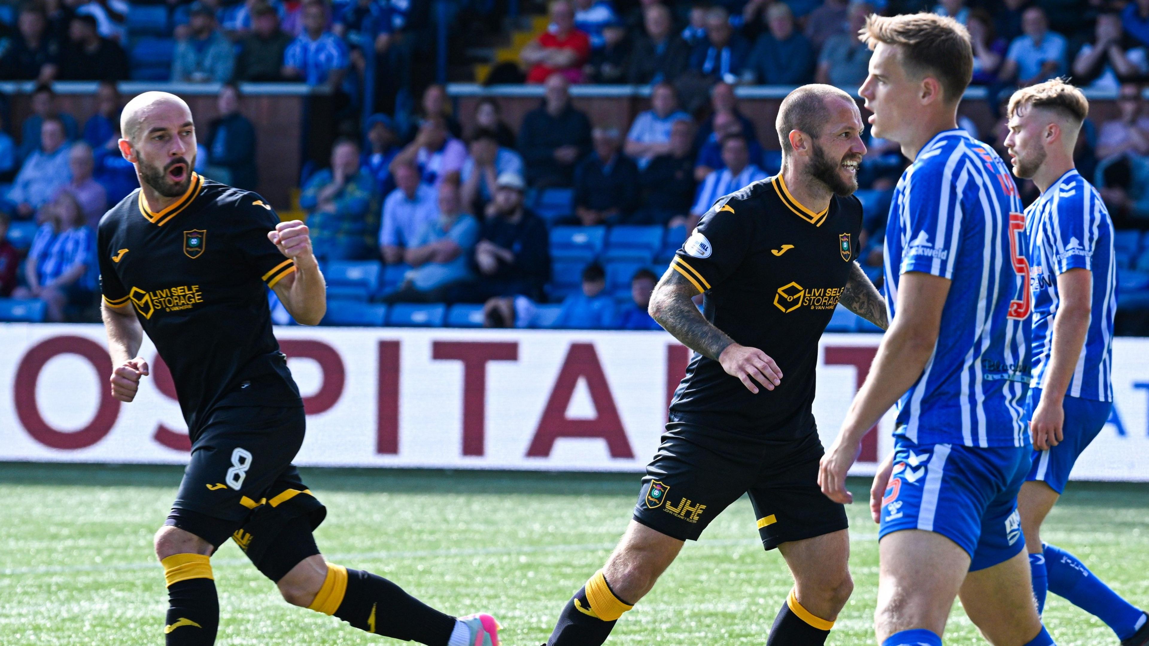 Scott Pittman celebrates scoring for Livingston