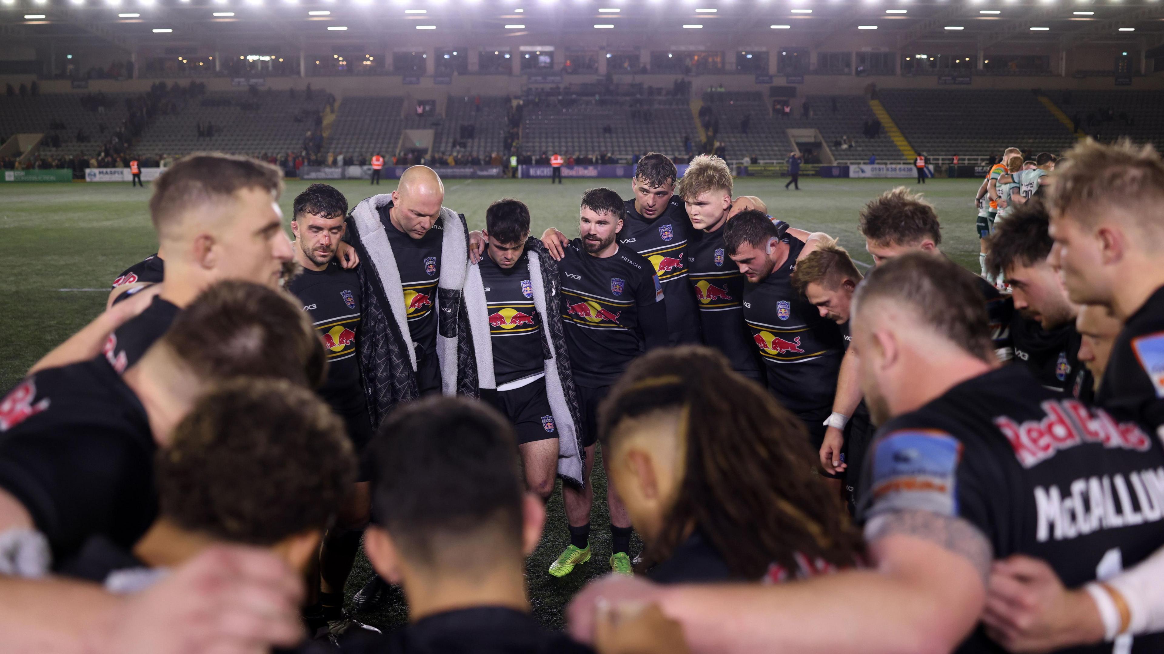 Newcastle Red Bulls in a huddle after their Prem Rugby Cup game at home to Leicester Tigers