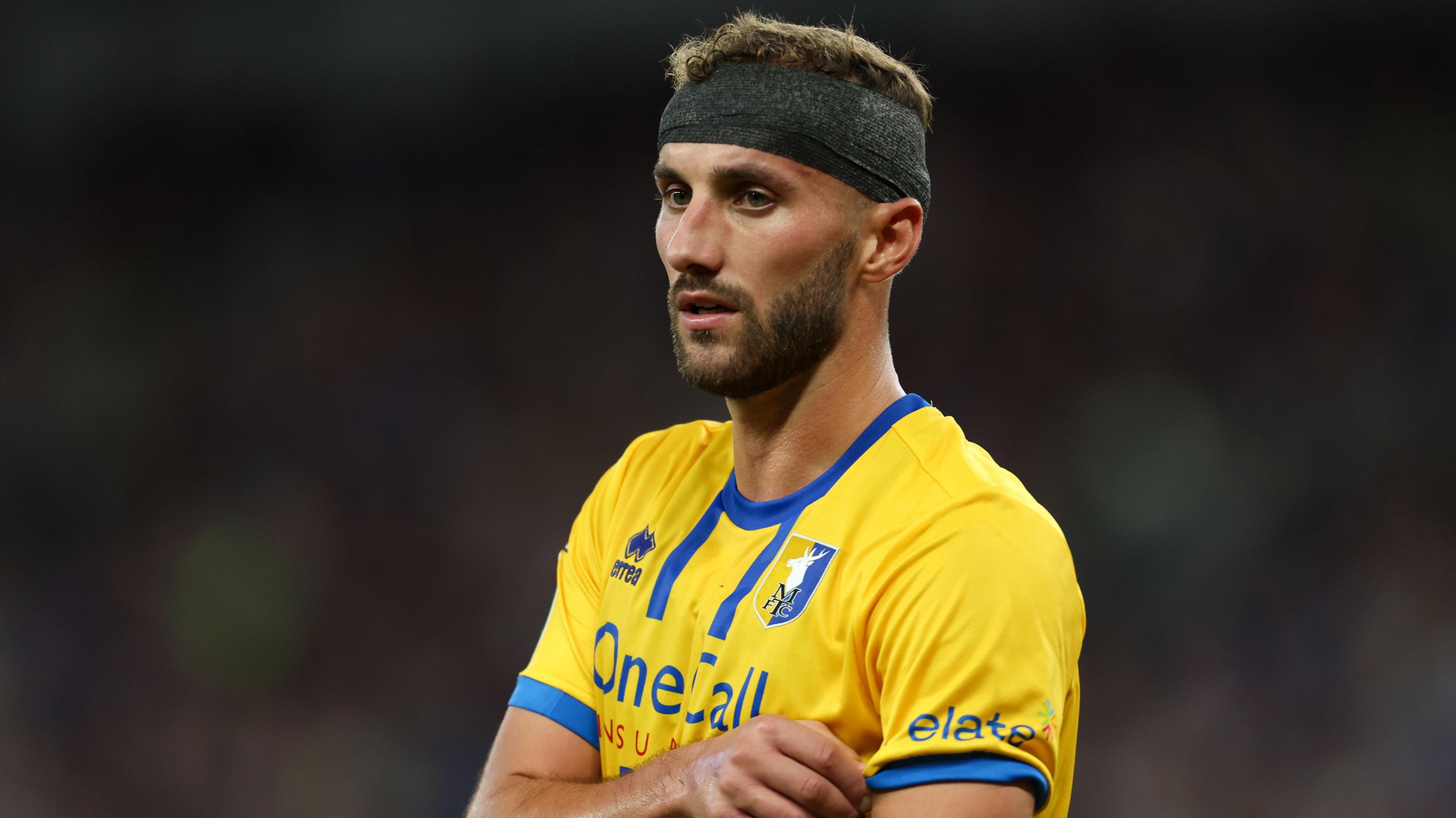 Baily Cargill playing for Mansfield Town