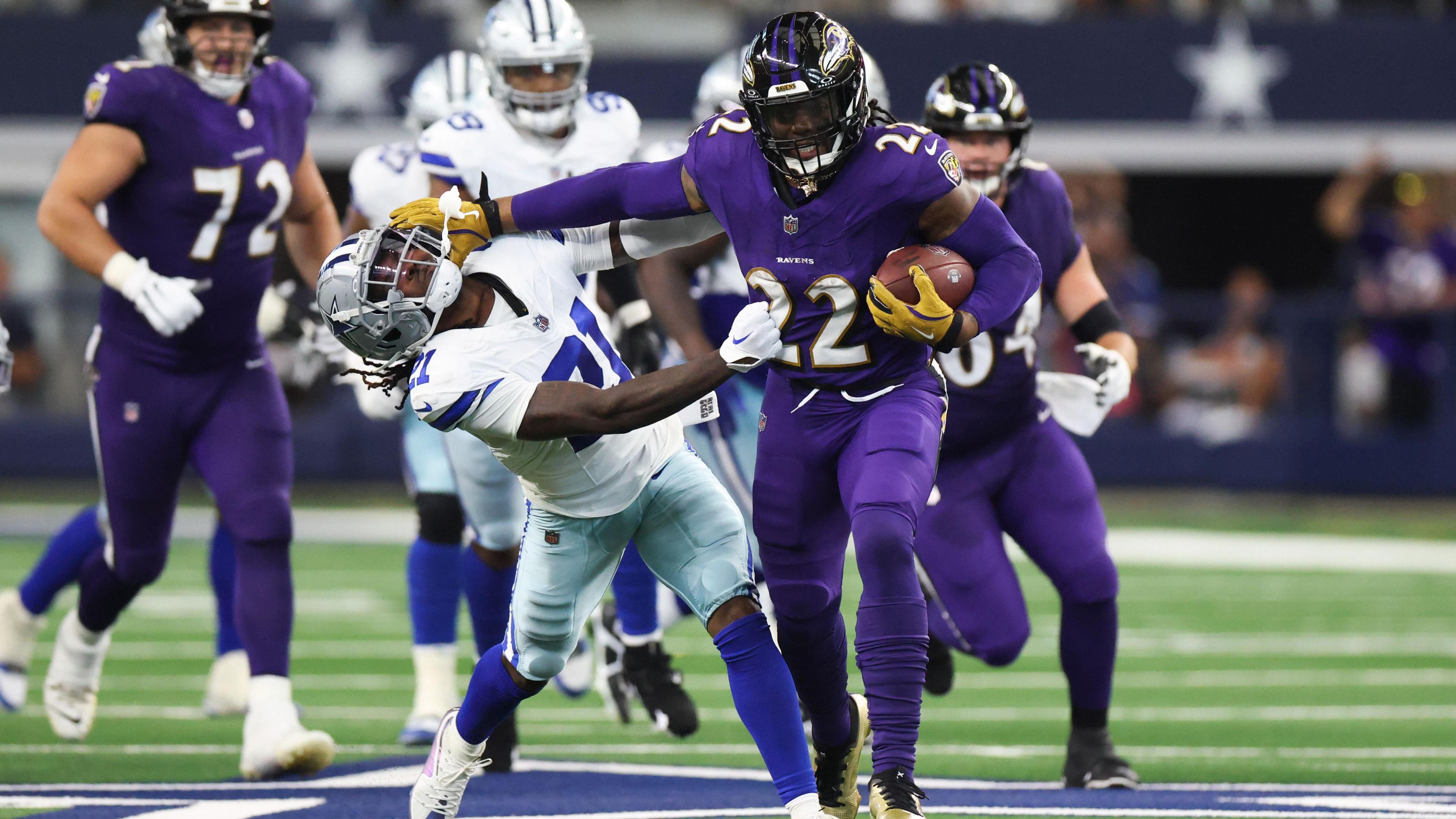 Baltimore Ravens running back Derrick Henry goes on a powerful run against the Dallas Cowboys