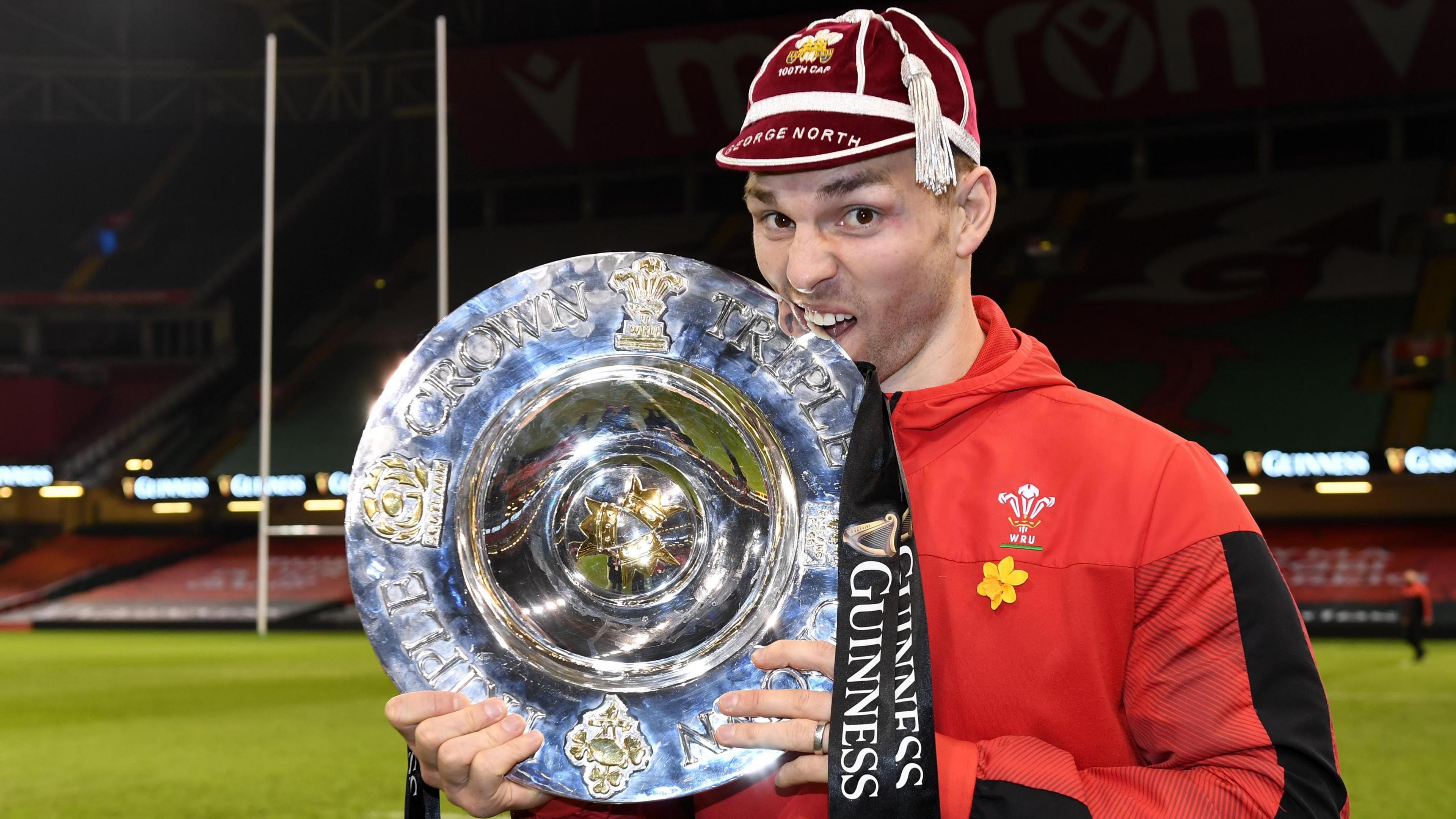 George North celebrates Wales' 2021 Triple Crown on his 100th appearance for his country in February 2021