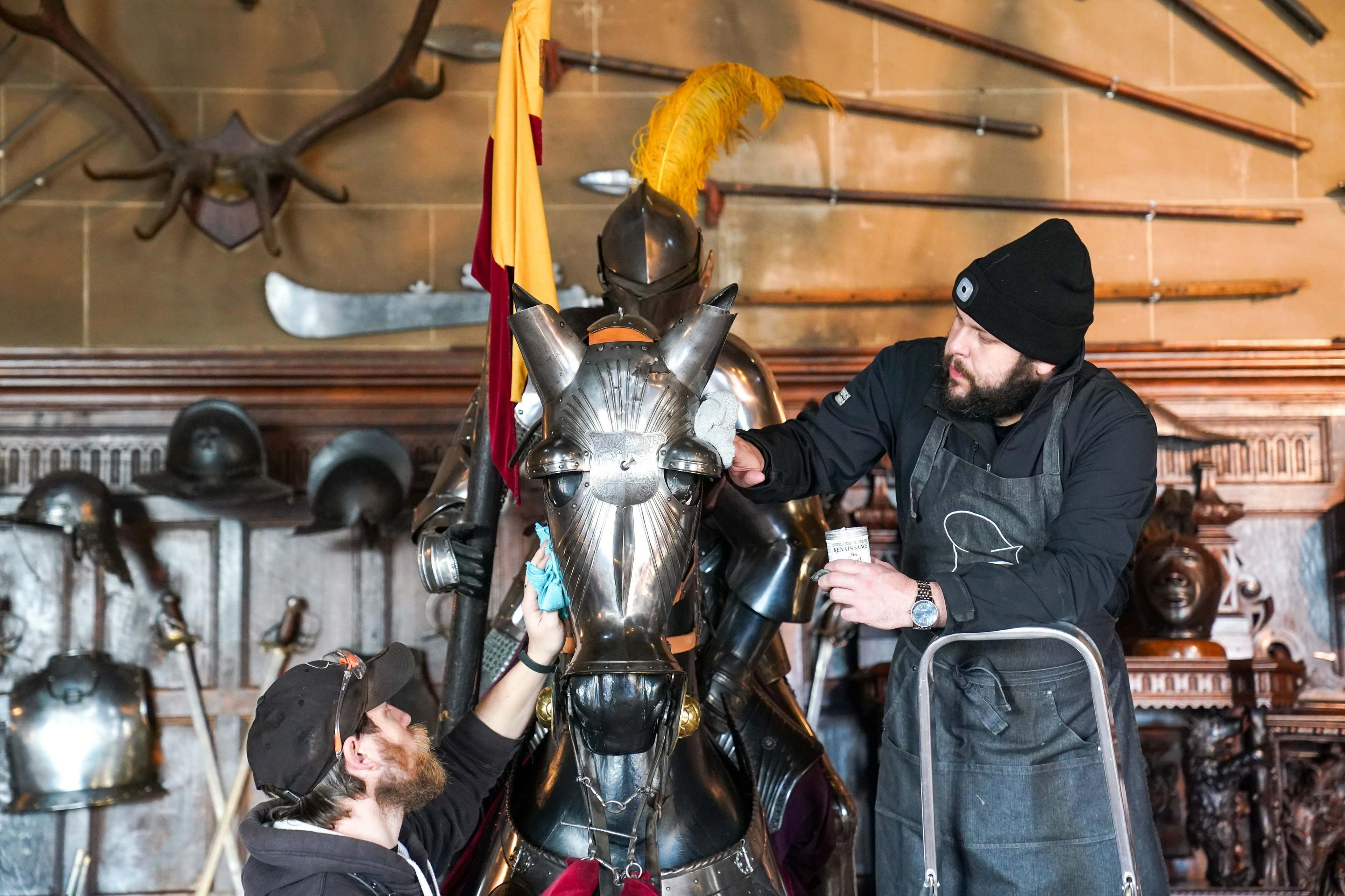 Staff cleaning armour