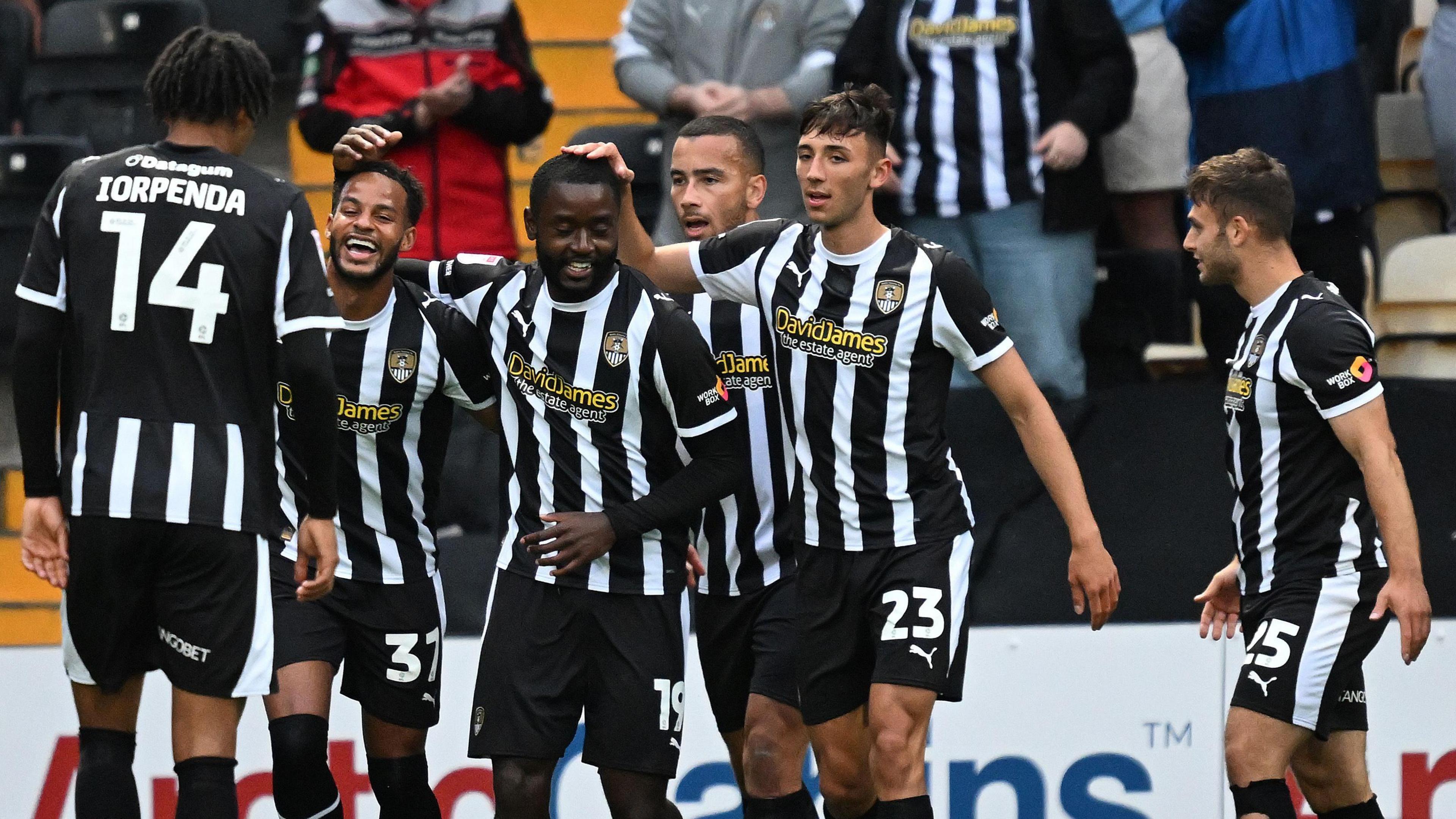 Notts County celebrate Matt Dennis' goal against Shrewsbury Town