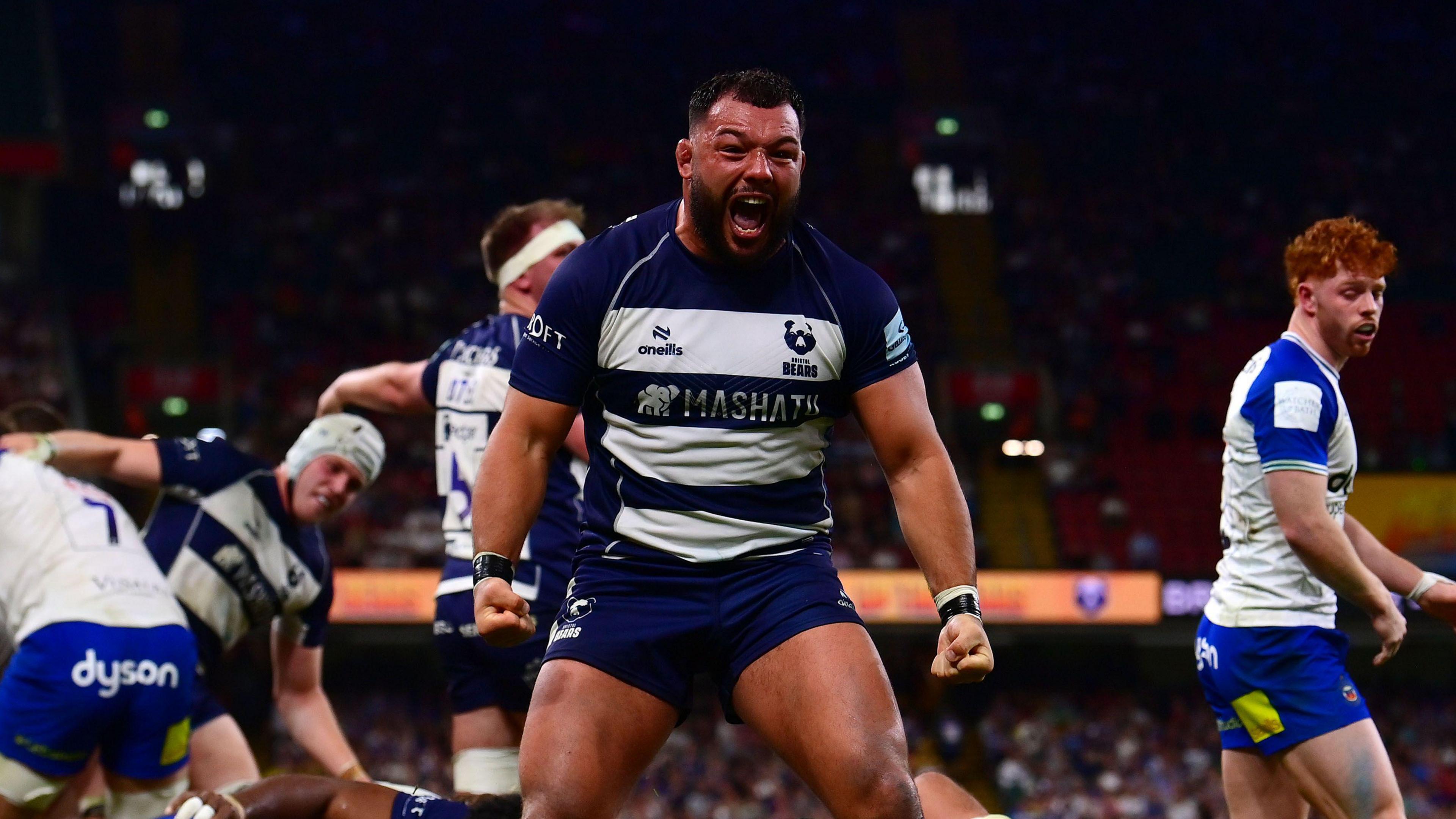 Ellis Genge celebrates Bristol team-mate Gabriel Oghre's try
