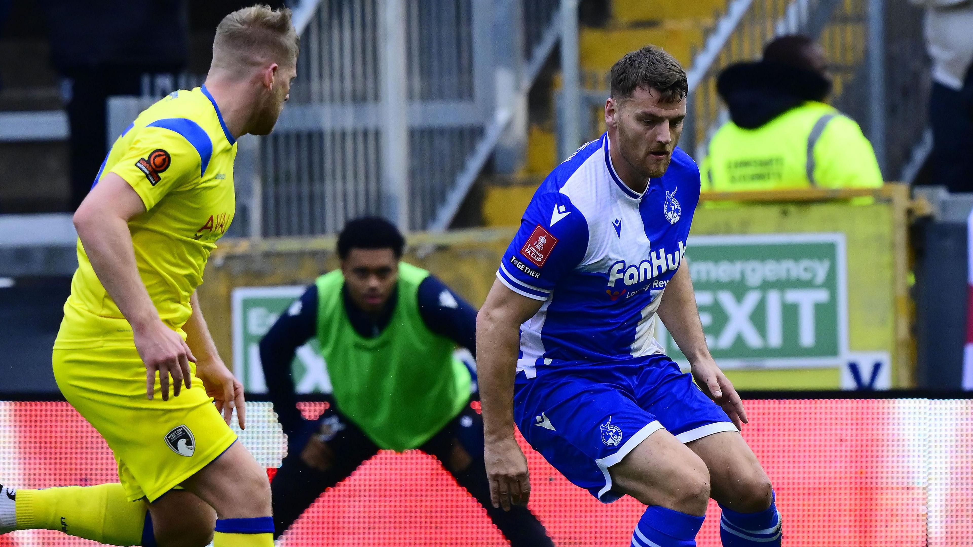 Chris Martin (right) with the ball during Bristol Rovers' FA Cup tie against Weston-super-Mare