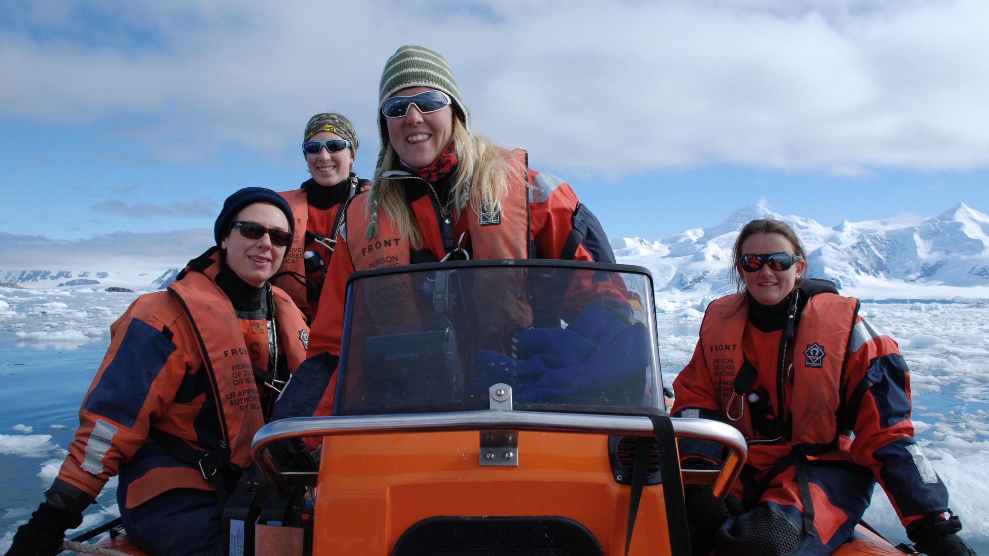 BAS team on a sled in Antarctica in the snow