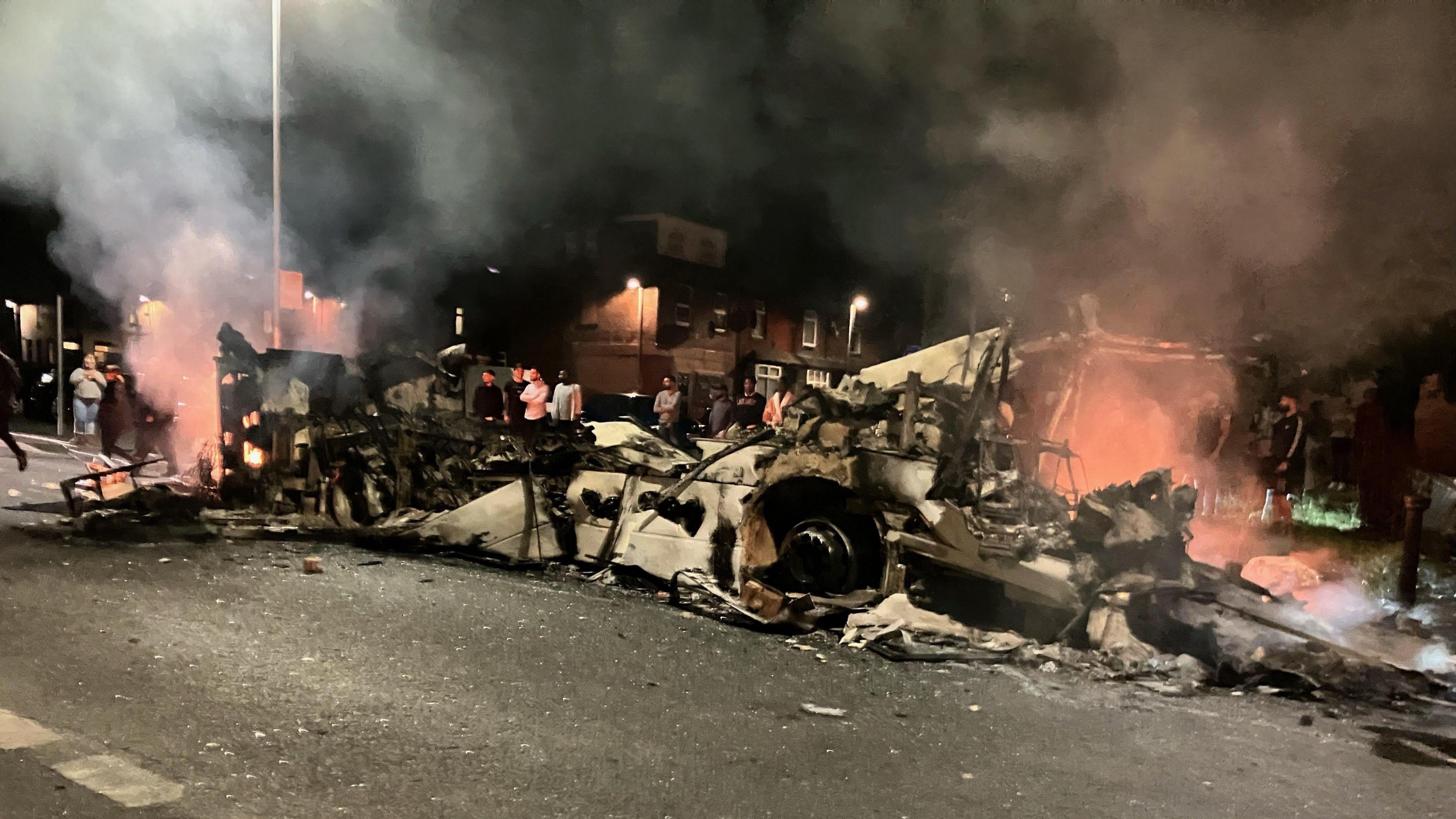 A burnt out bus in Harehills