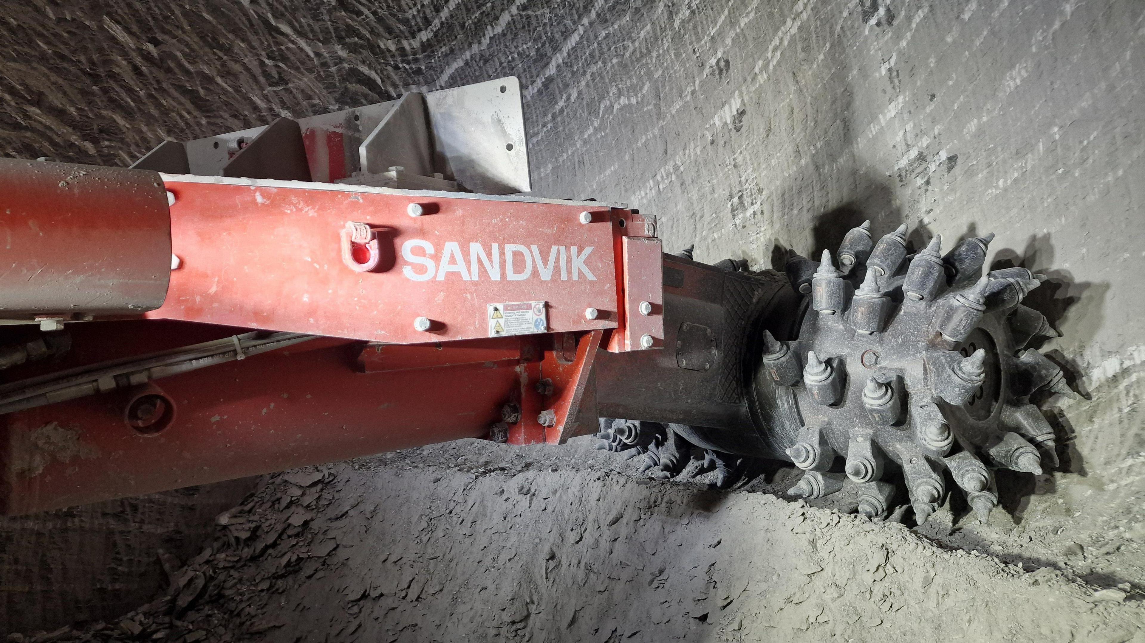 The machine that cuts through the gypsum inside the mine. It has large bolts on the outside appearing like a giant porcupine. 