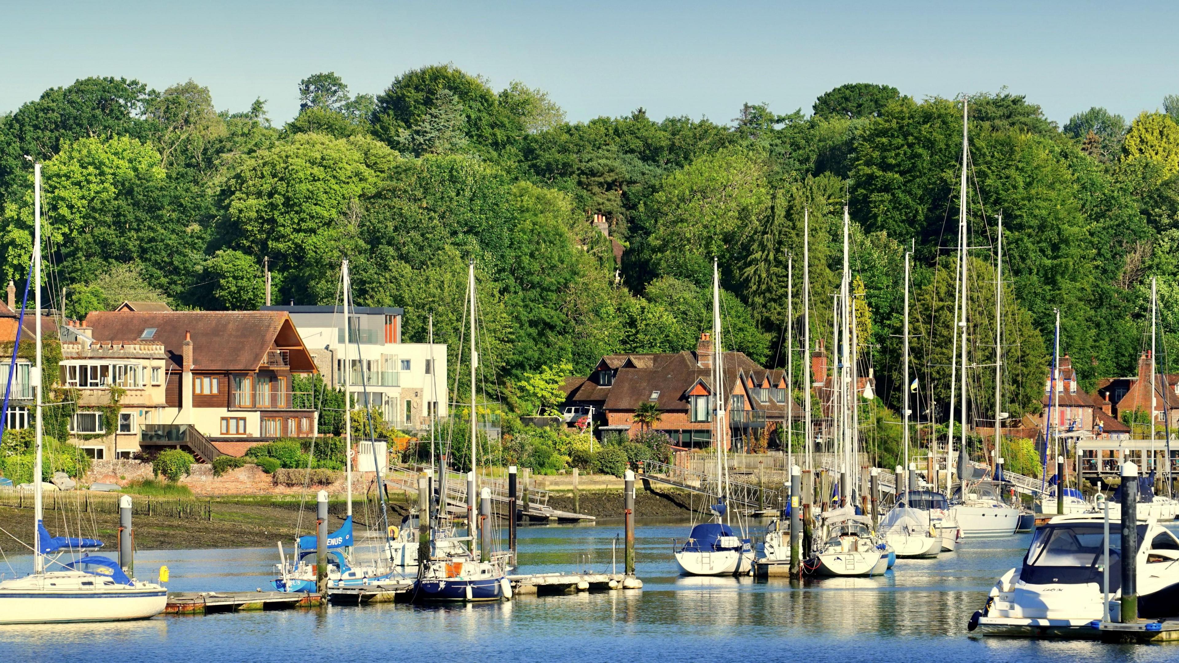 MONDAY - The river Bursledon with yachts moored and houses on the opposite bank 