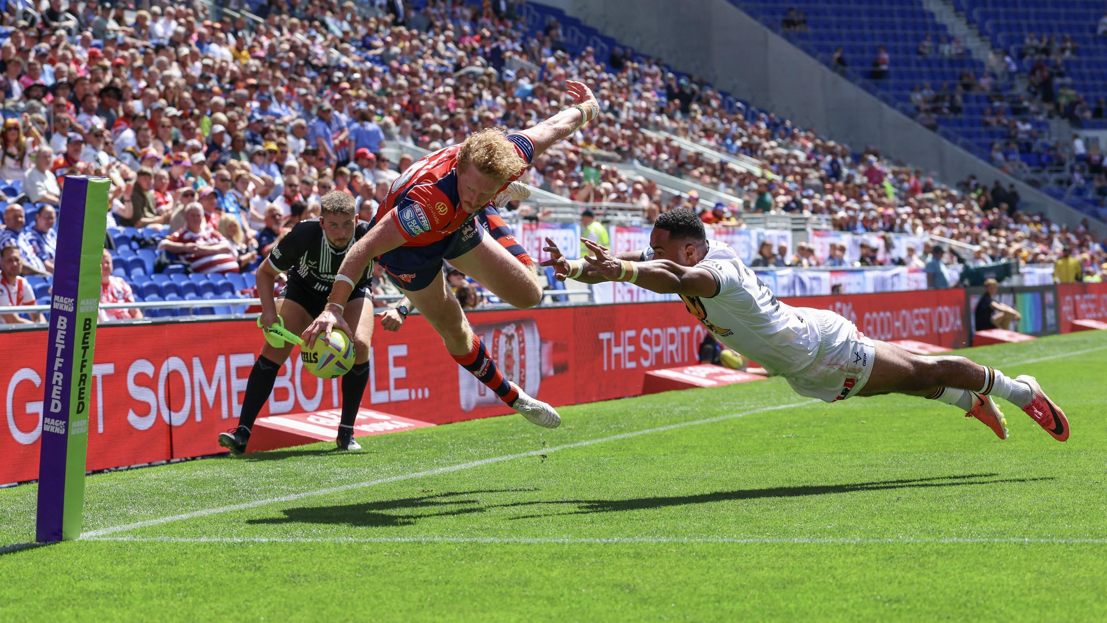 Lachlan Walmsley leaps into the corner for a spectacular try for Wakefield against Castleford
