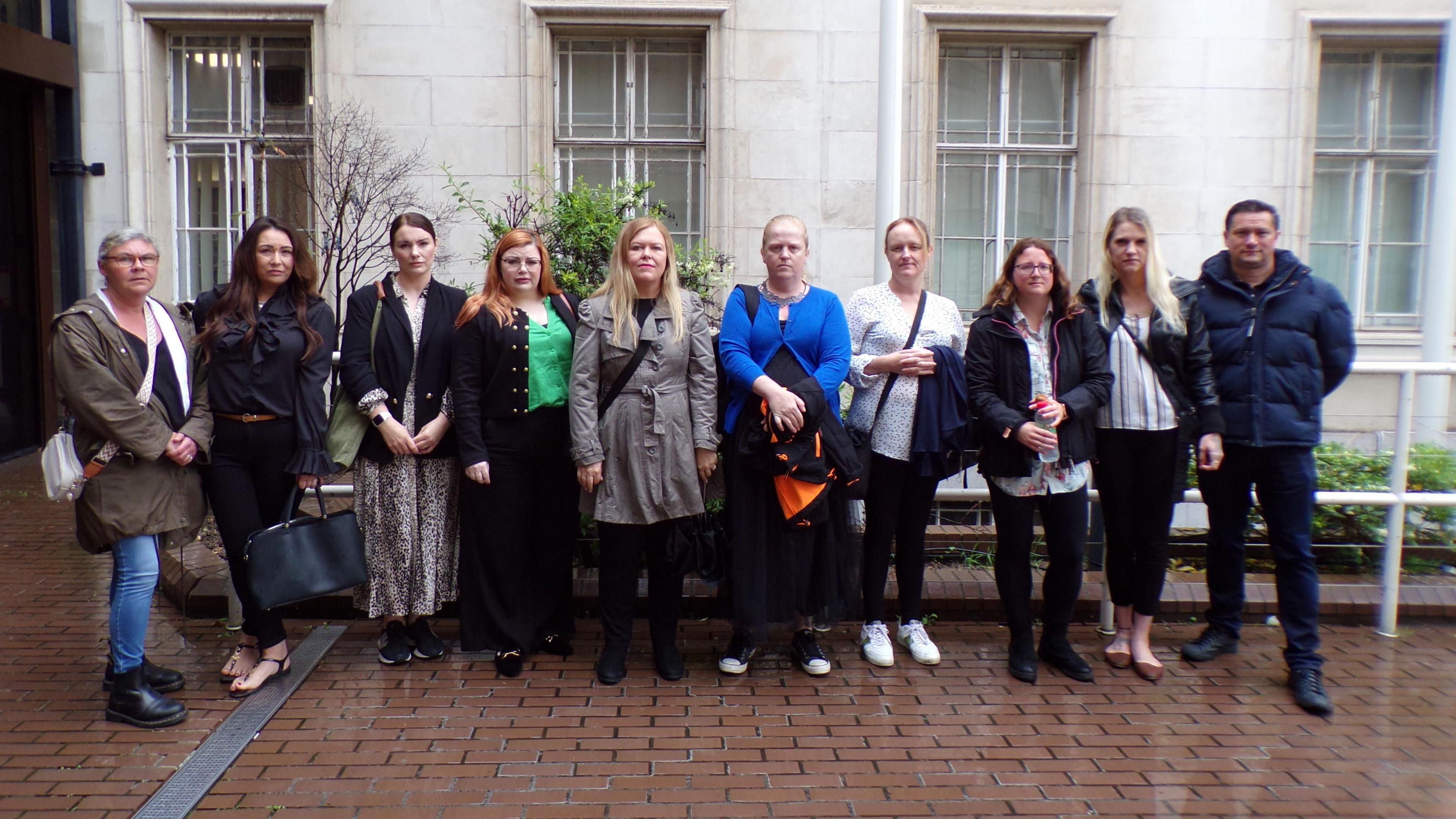 A group of parents standing outside County Hall in Chelmsford