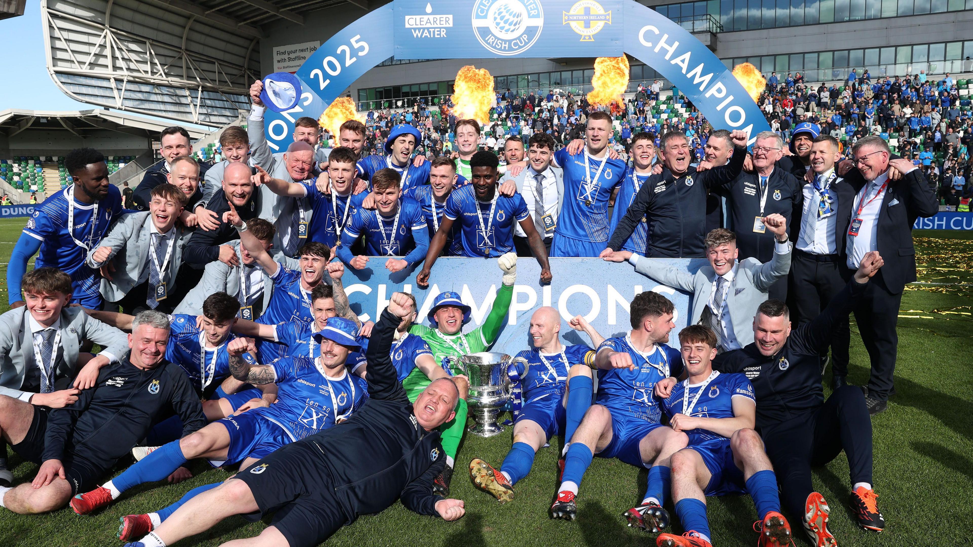 Dungannon Swifts players and officials celebrate last year's Irish Cup final win