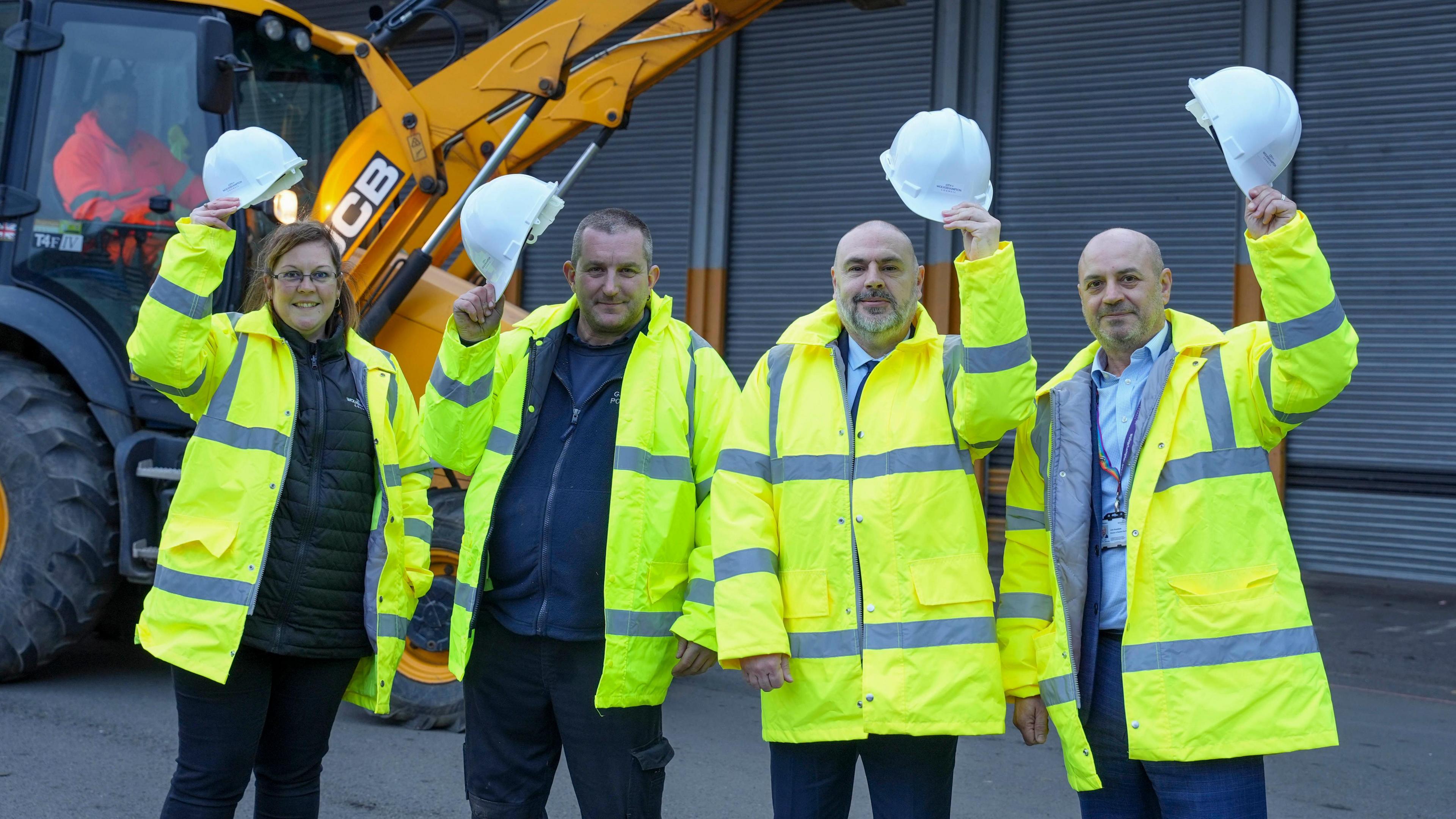 Joanne Huntbatch, Markets General Manager, Wolverhampton Wholesale market trader Michael Wakeman, from G. Marsh Potatoes, Councillor Craig Collingswood, Cabinet Member for Environment and Climate Change at City of Wolverhampton Council and John Roseblade, Director of Resident Services at City of Wolverhampton Council at the site in Hickman Avenue.