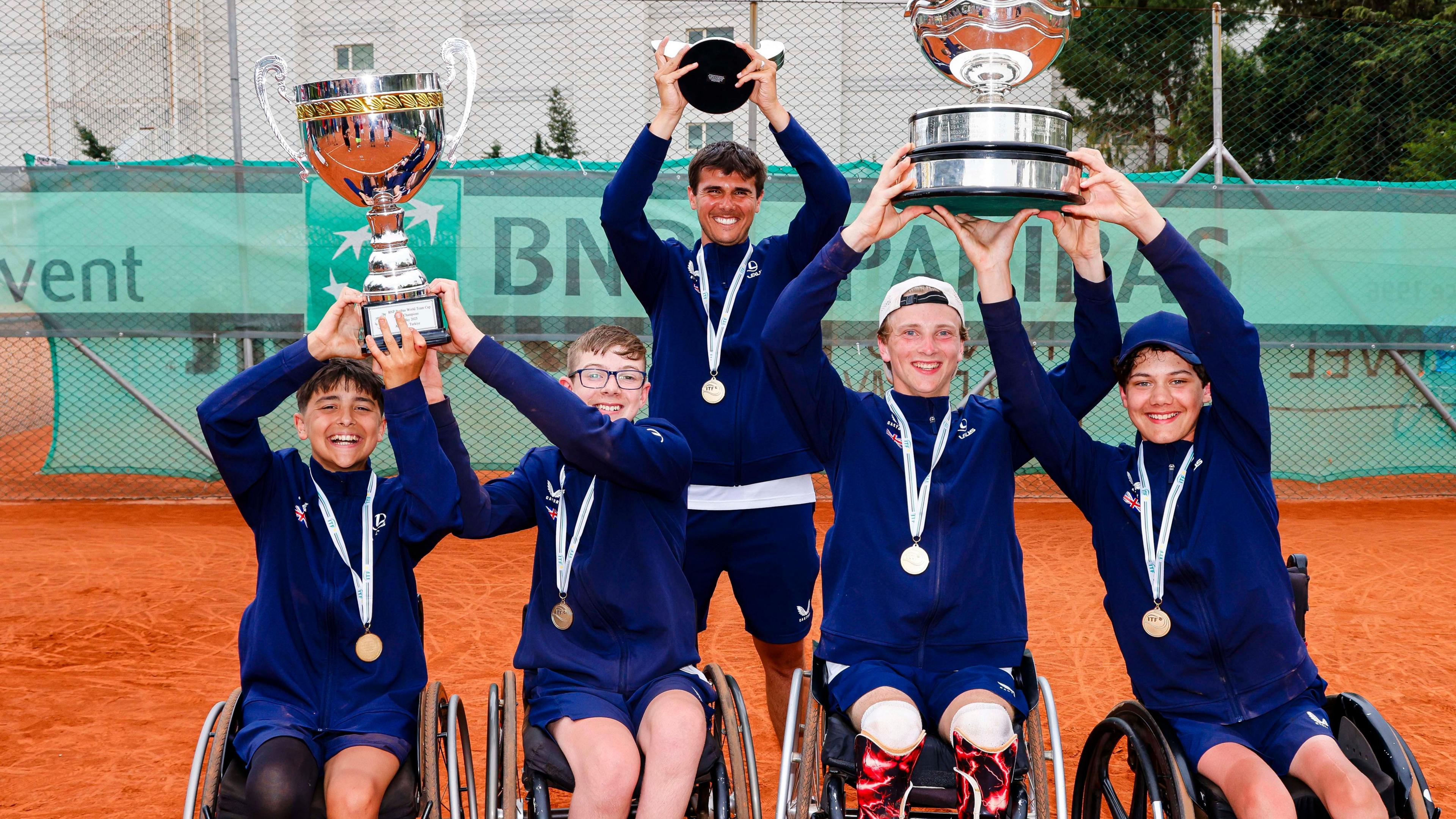 Great Britain's junior team lift the World Team Cup trophy