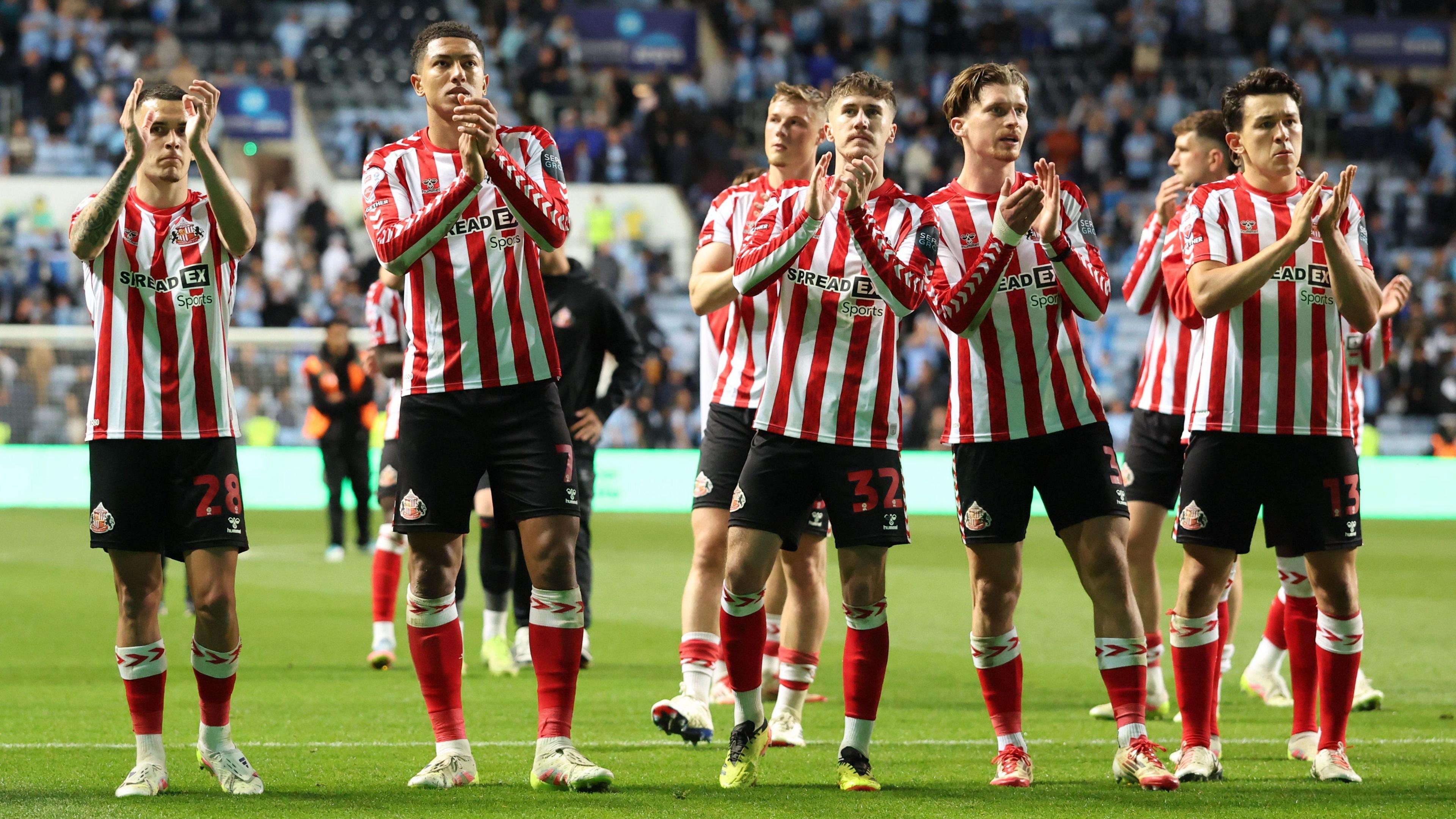 Sunderland players clap their fans after the 2-1 win at Coventry in the Championship play-off semi-final first leg
