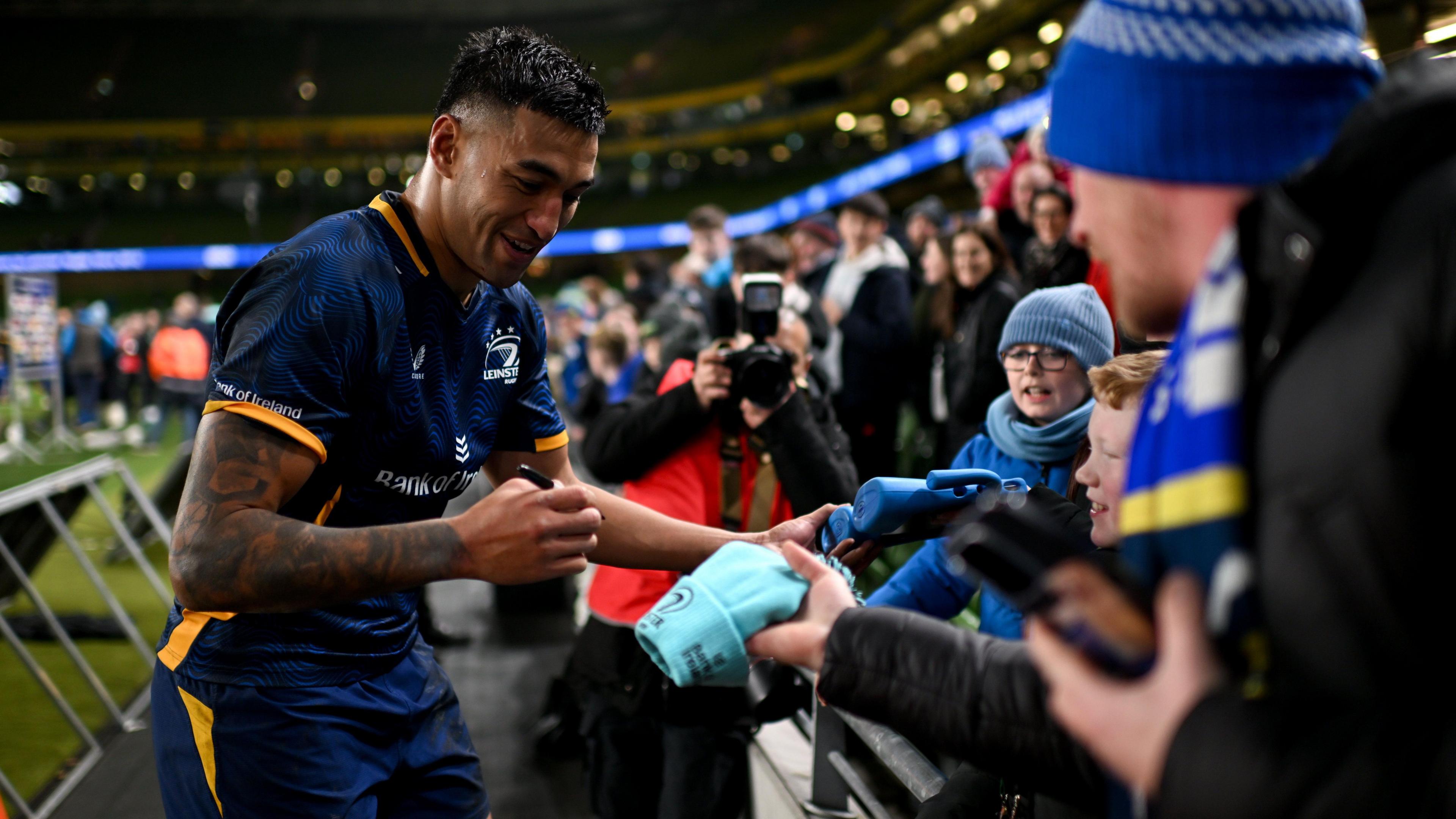 Rieko Ioane signs autographs for fans