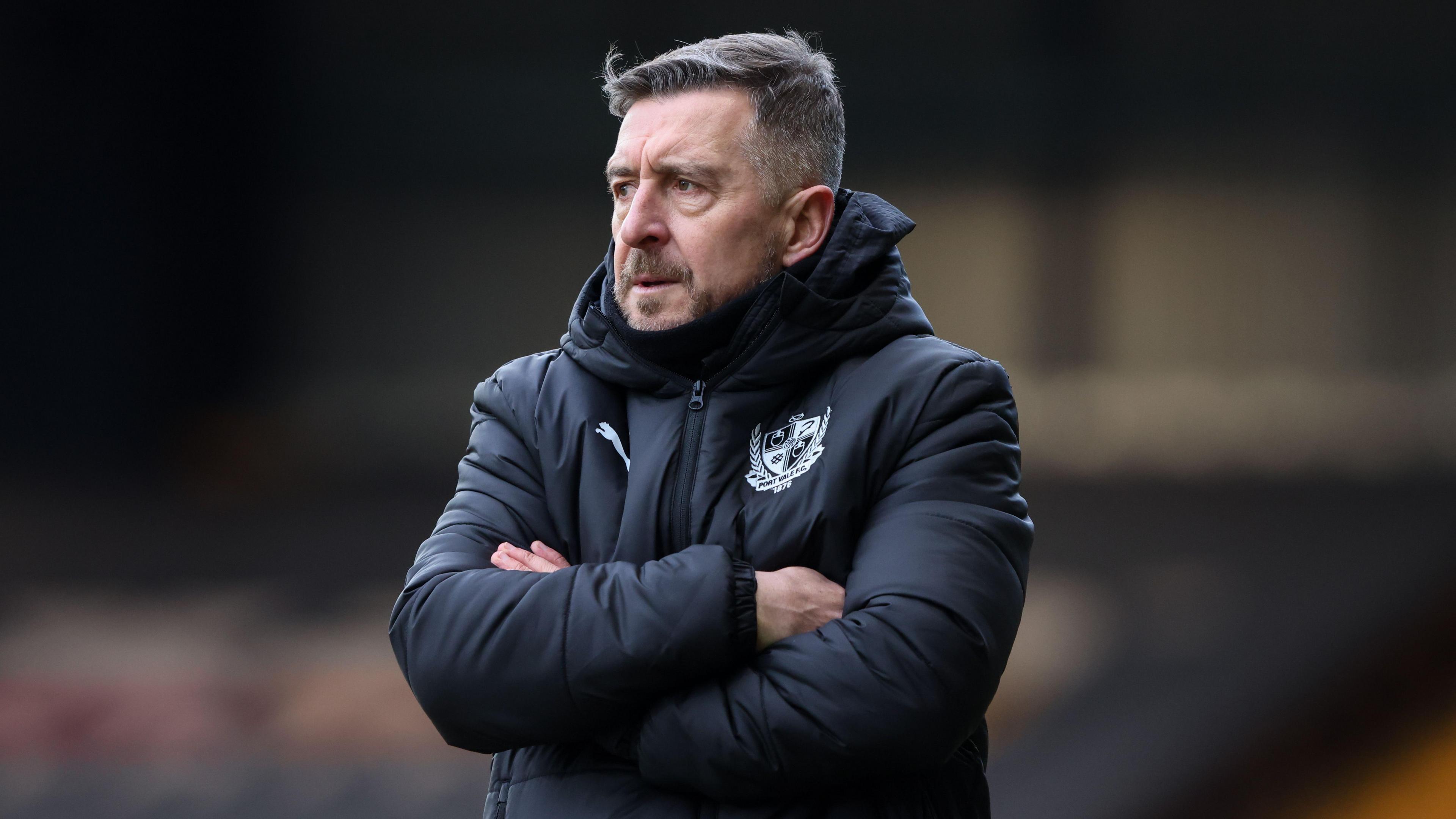 Jon Brady looks on from the touchline during Port Vale's defeat to Exeter