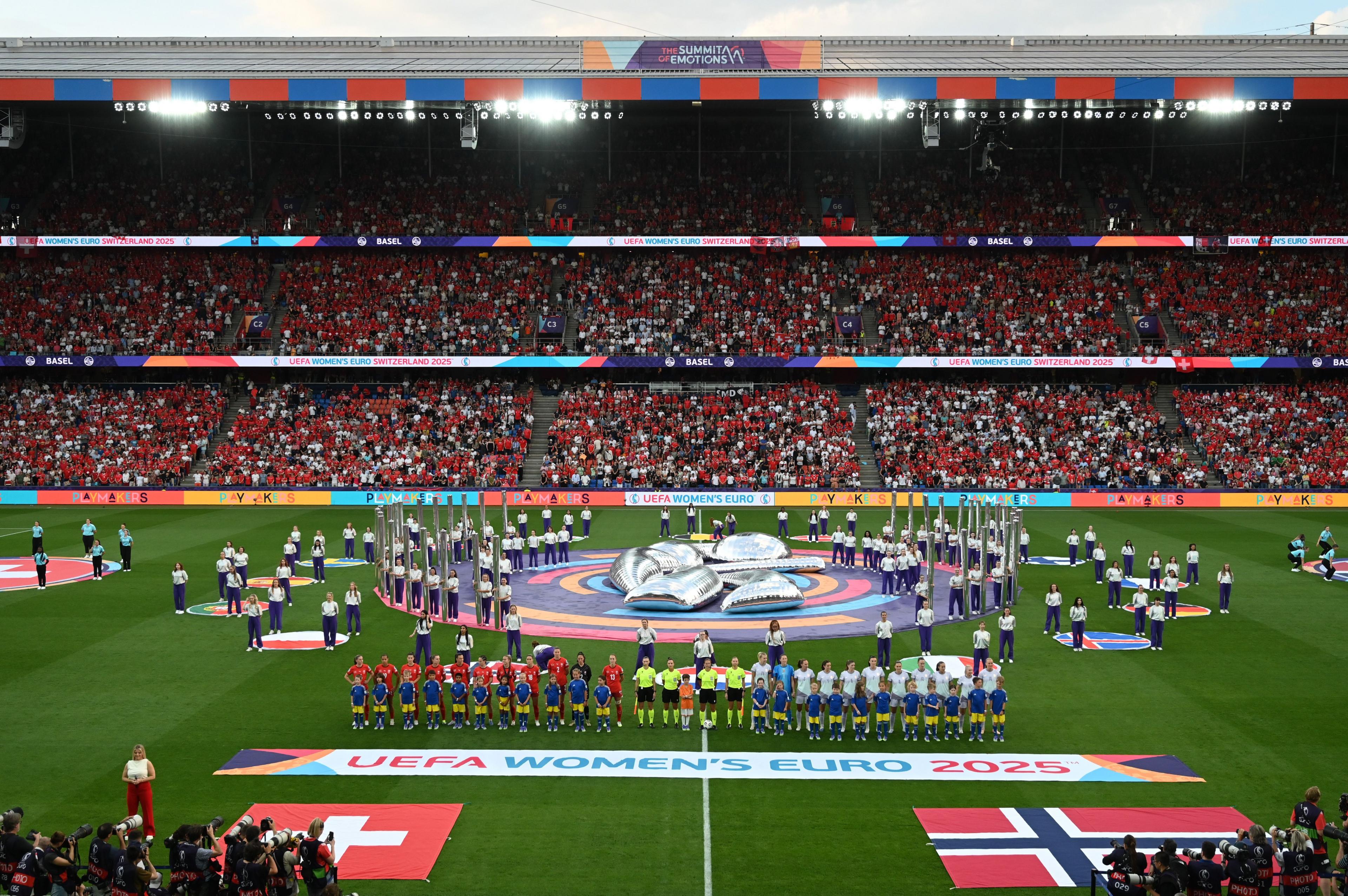 Switzerland and Norway lineup on the pitch prior to the opening match. Photo by Chris Ricco