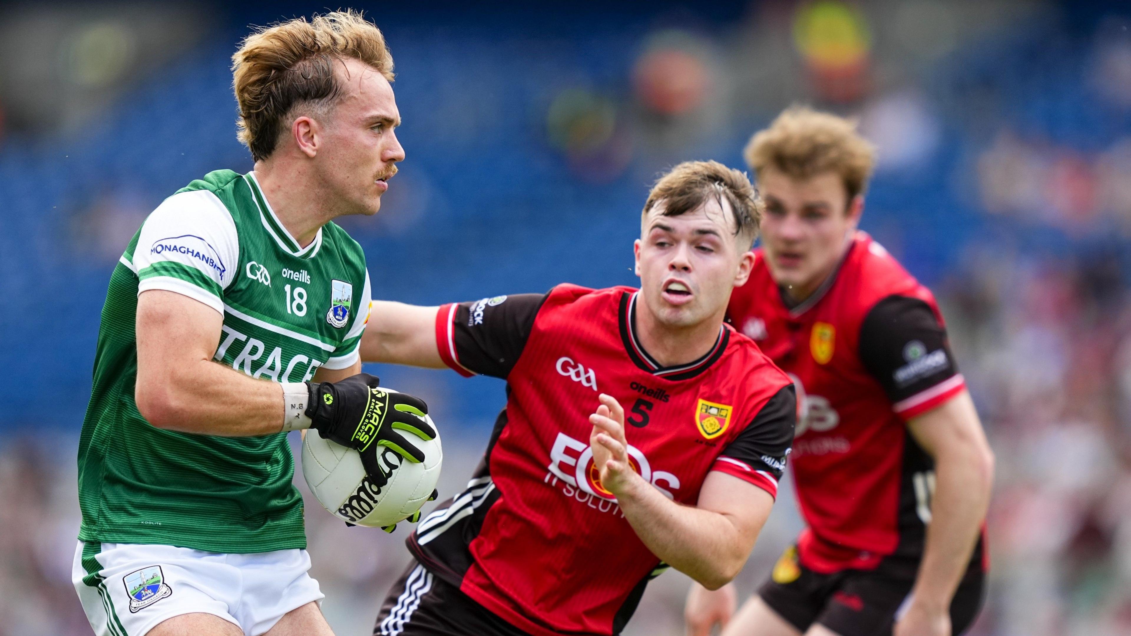 Ultan Kelm in action with Callum Rogers
