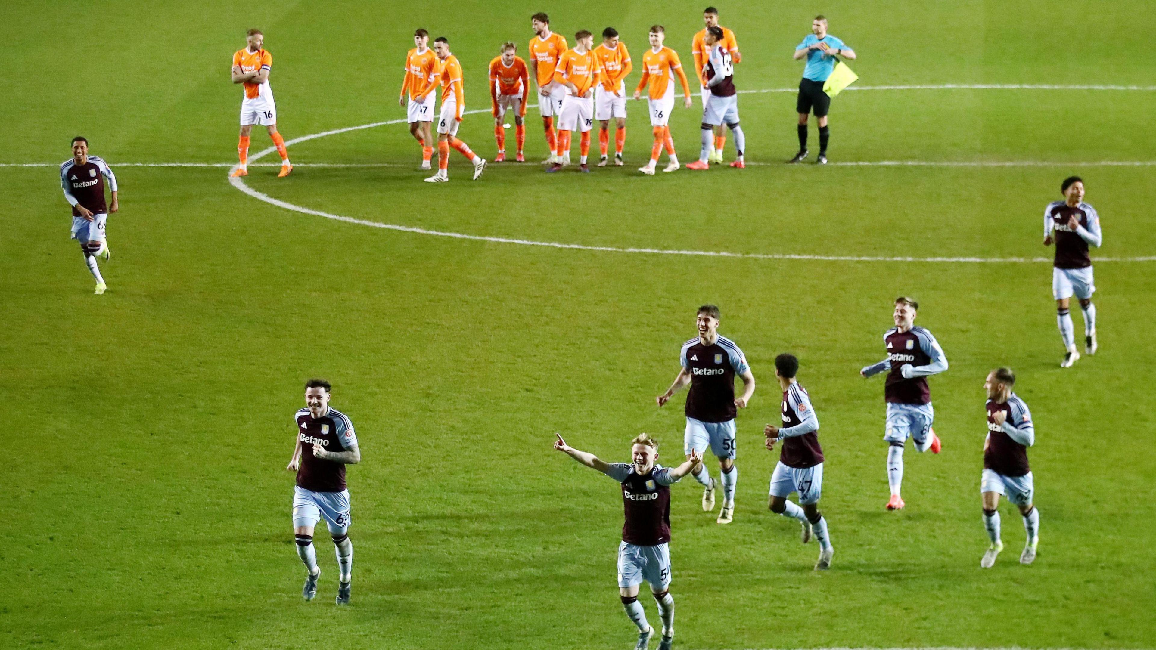 Aston Villa's Under-21 side celebrate beating Blackpool in the Vertu Trophy after an epic penalty shootout