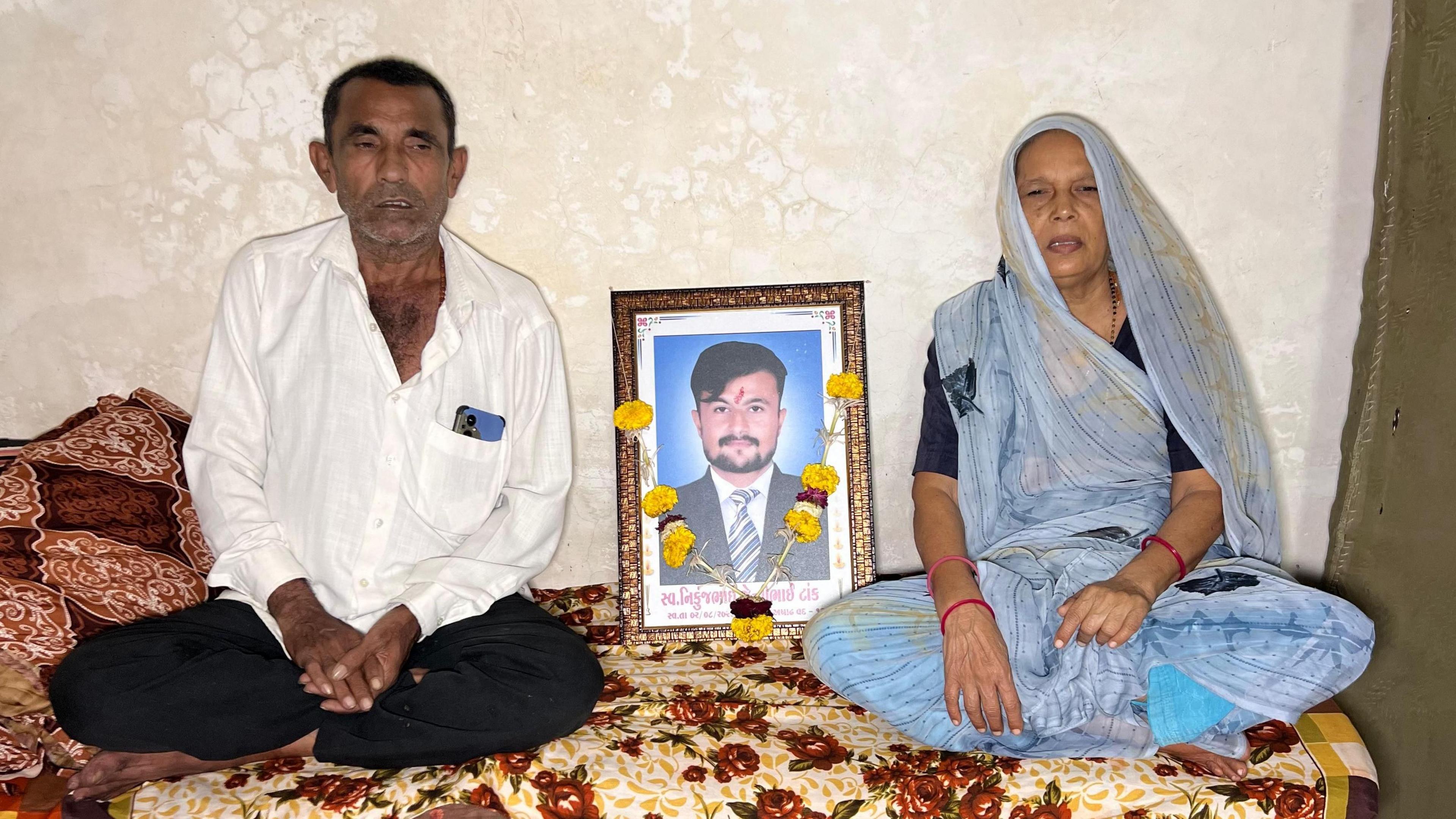 Parents of diamond polishing worker Nikunj Tank say he took his life as the downturn in the industry left him jobless