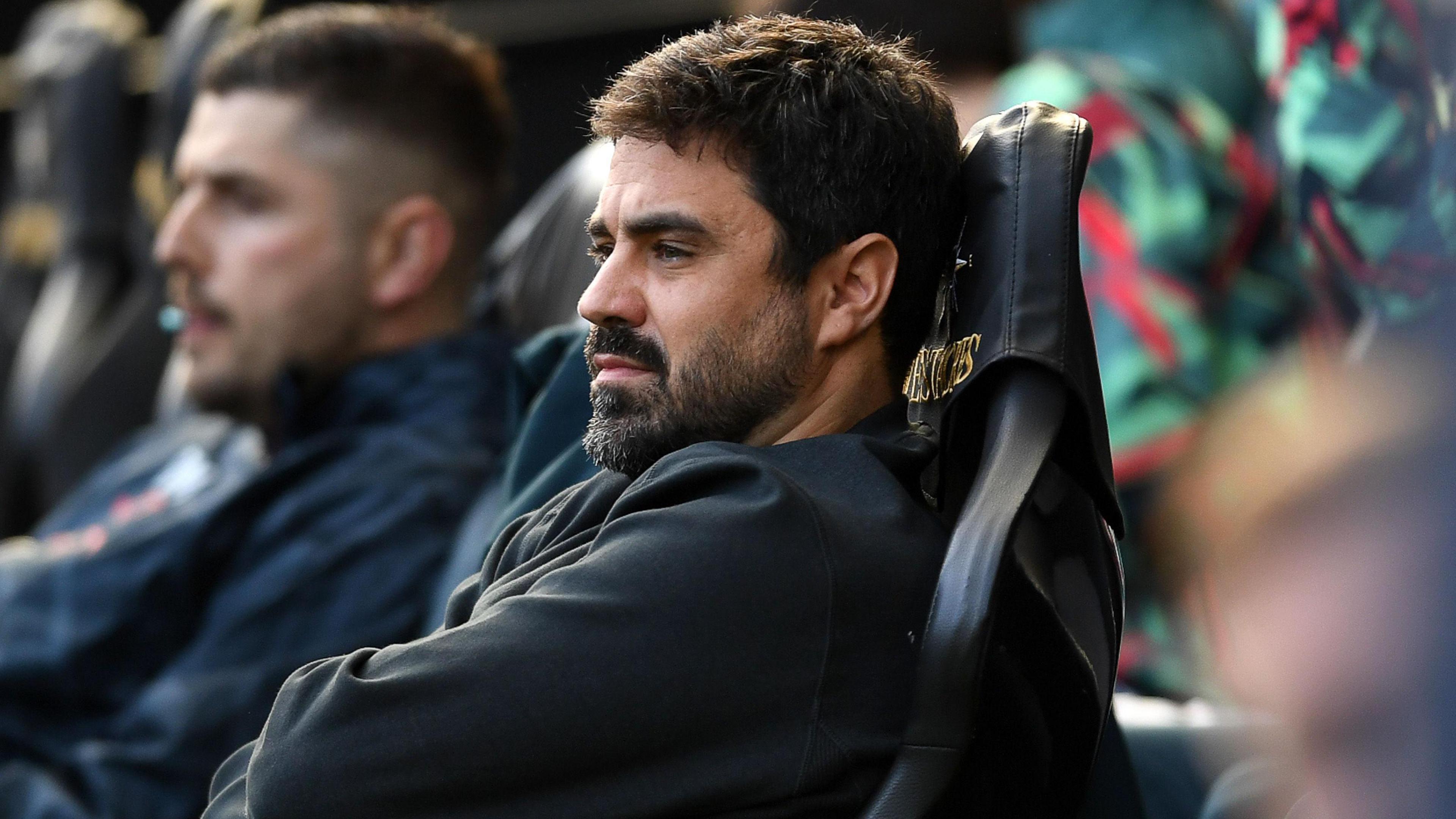 Vitor Matos sitting in the Swansea dugout 