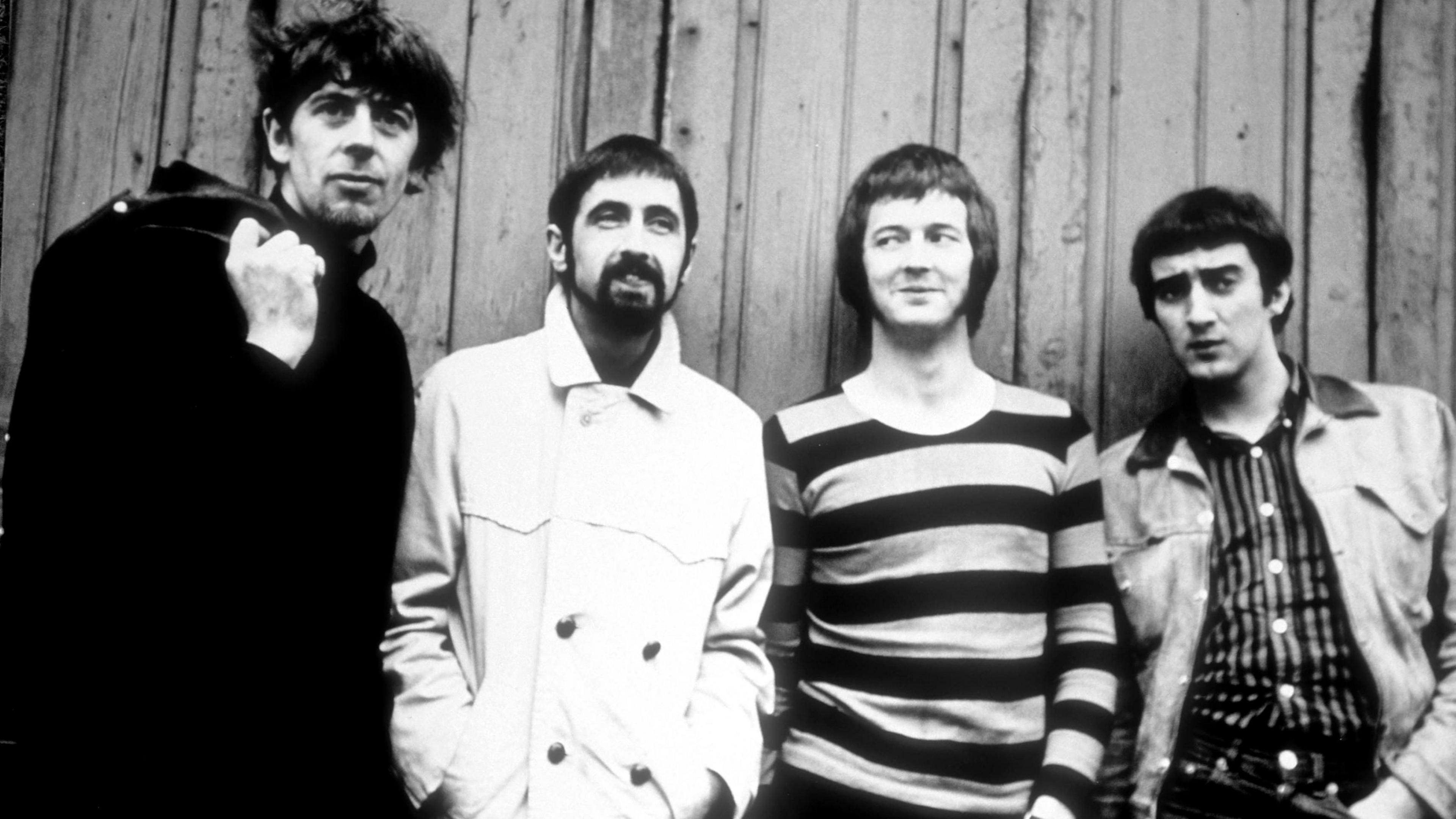 LONDON - 1966: Rock band the "Bluesbreakers" pose for a portrait in 1966 in London, England. L-R: John Mayall, Hughie Flint, Eric Clapton, John McVie. 