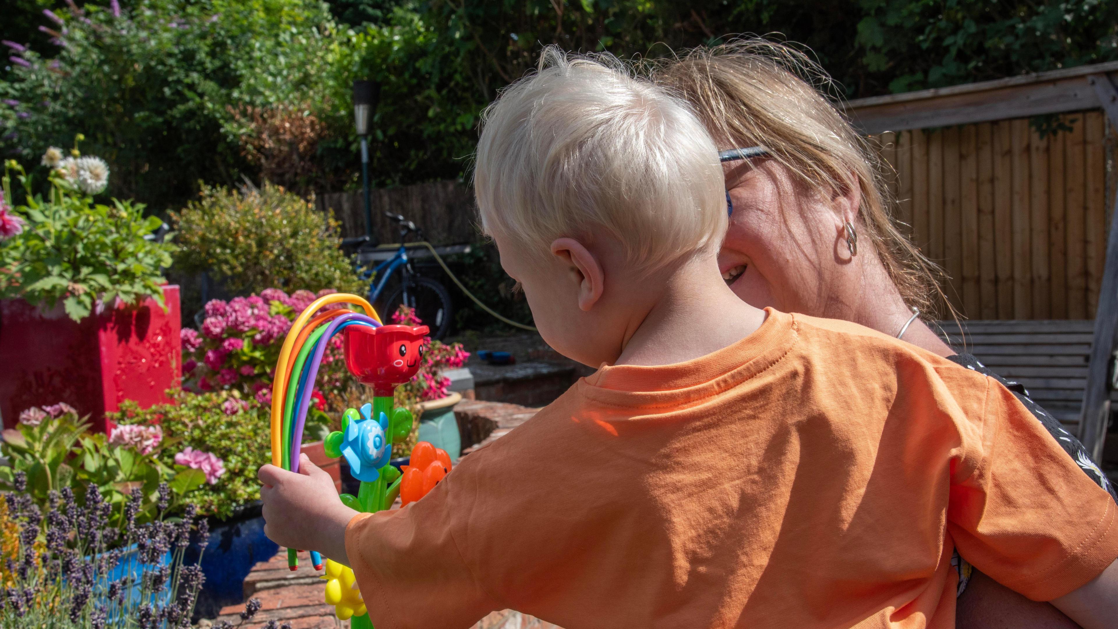 Archie with his foster carer Nancy