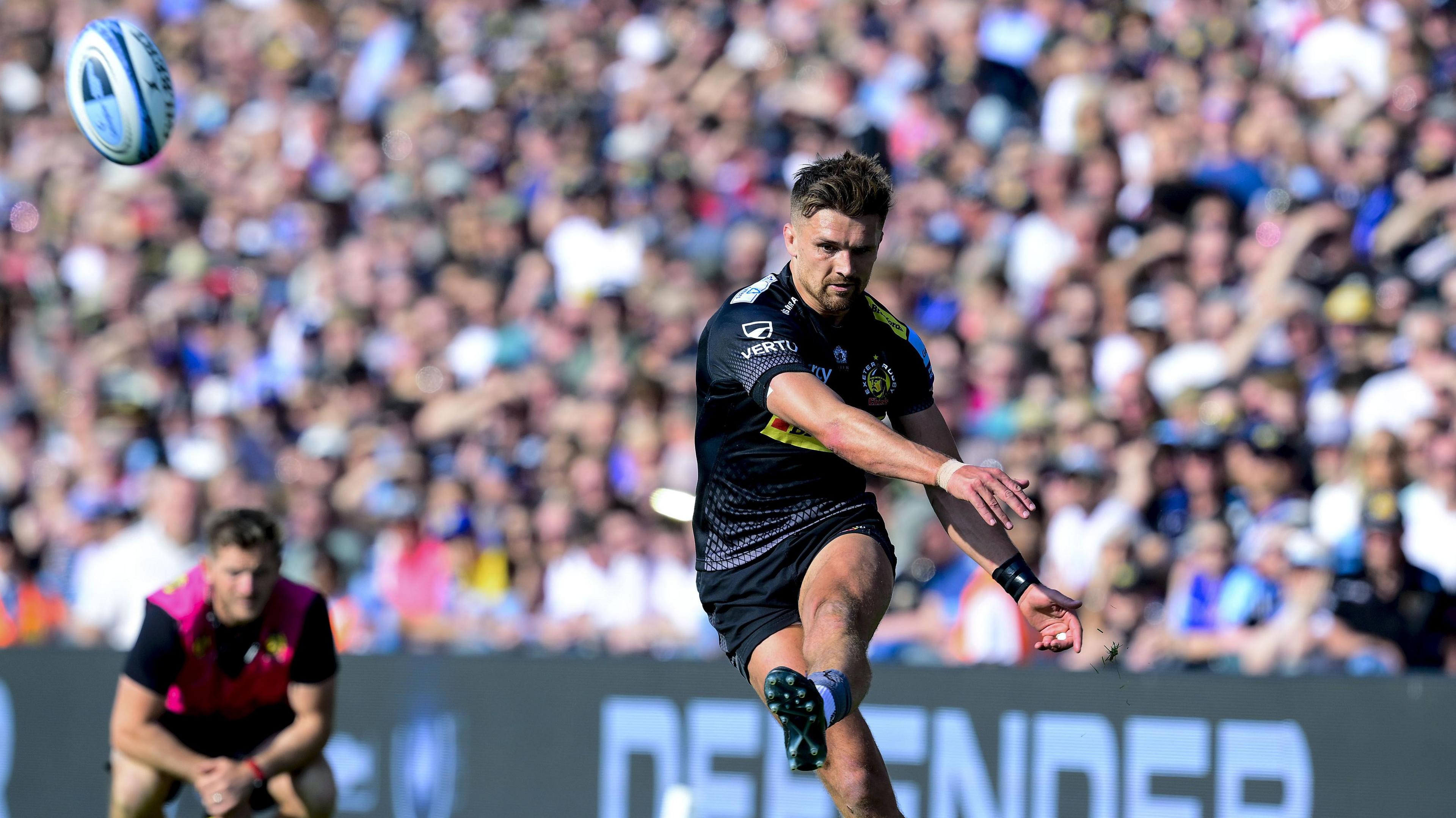 Henry Slade kicks a penalty