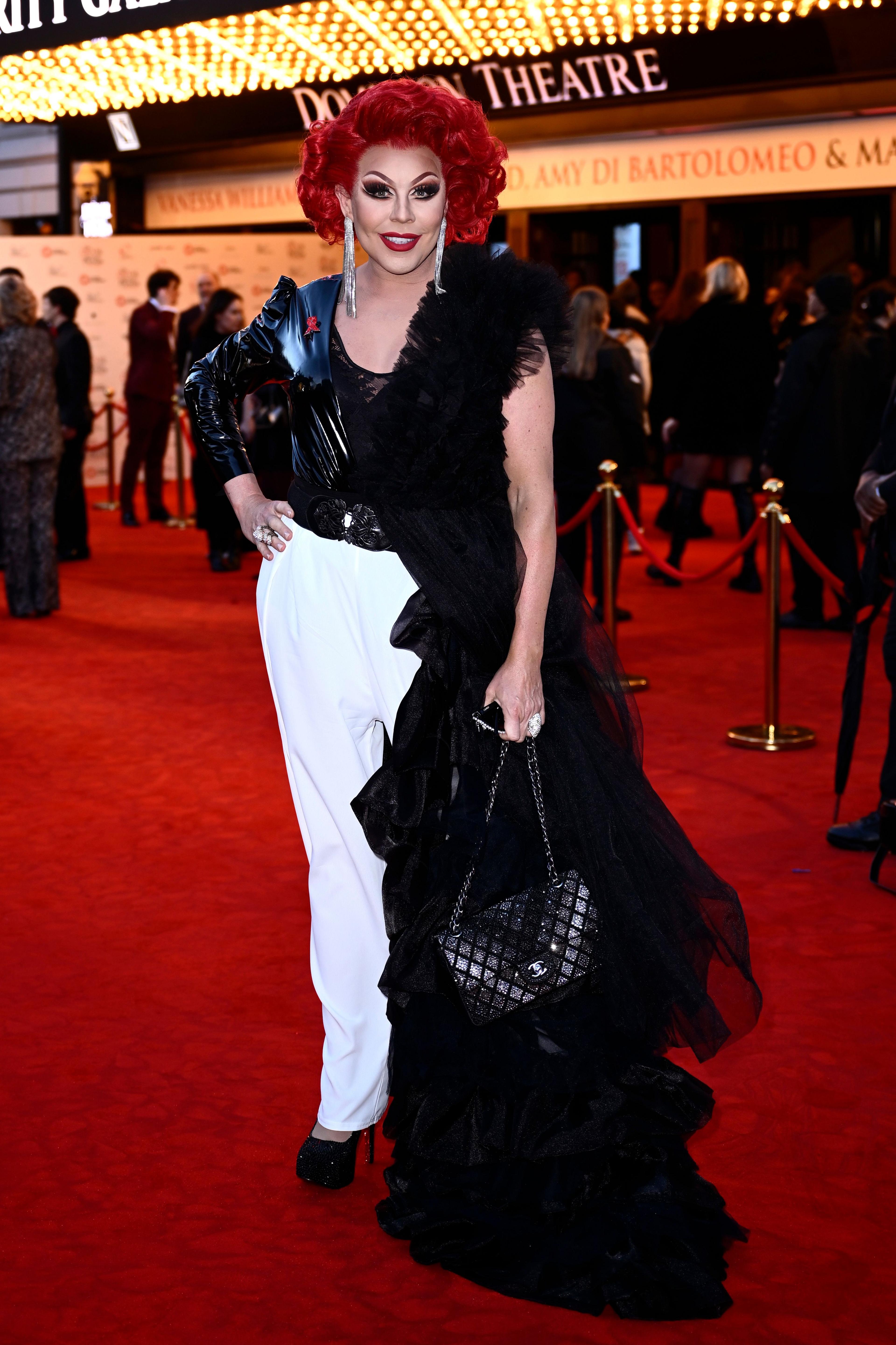 La Voix posing on red carpet at the Dominion Theatre, London