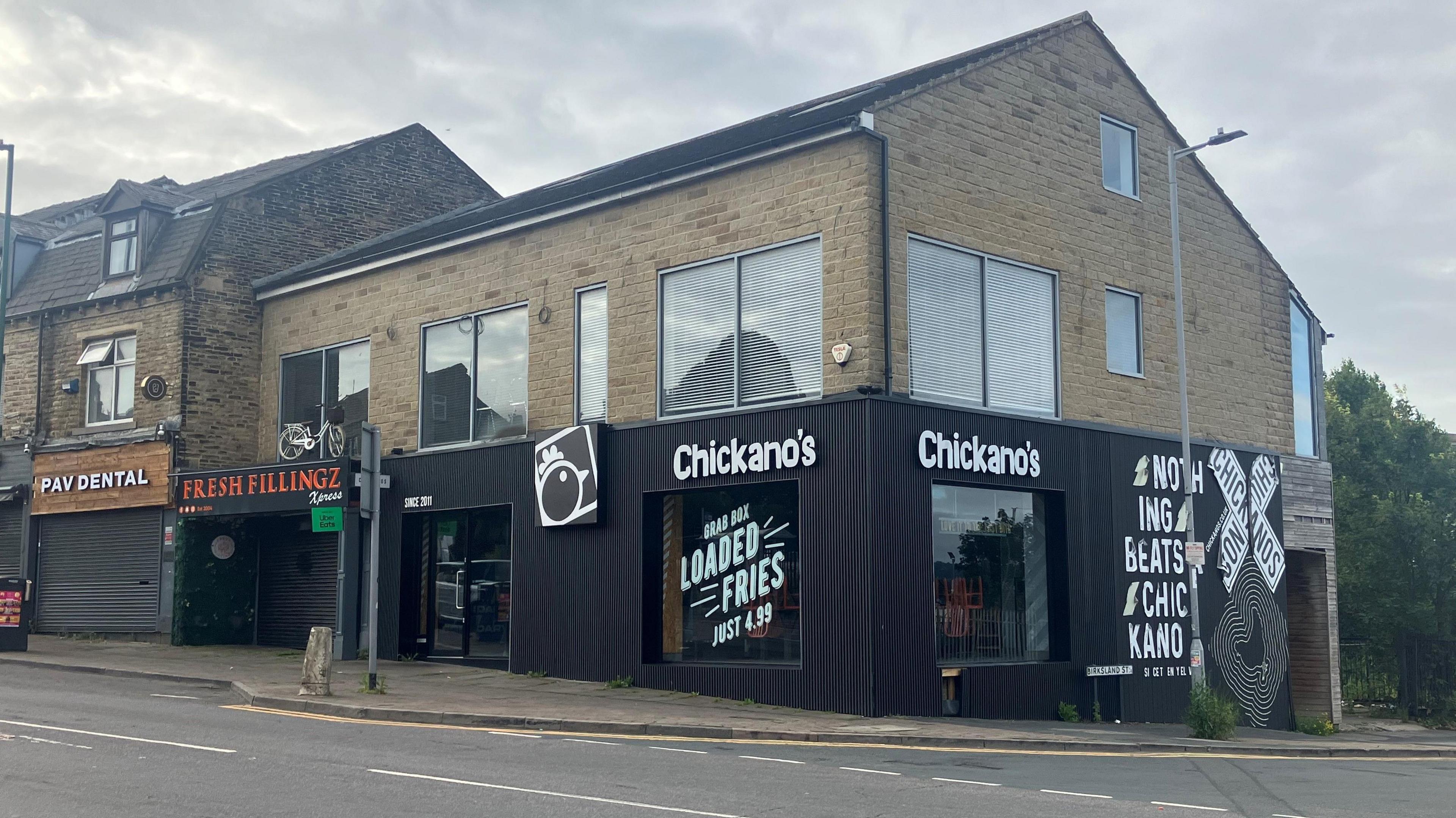 Chickano's on Leeds Road, which has black exterior fittings with Chickano lettering.