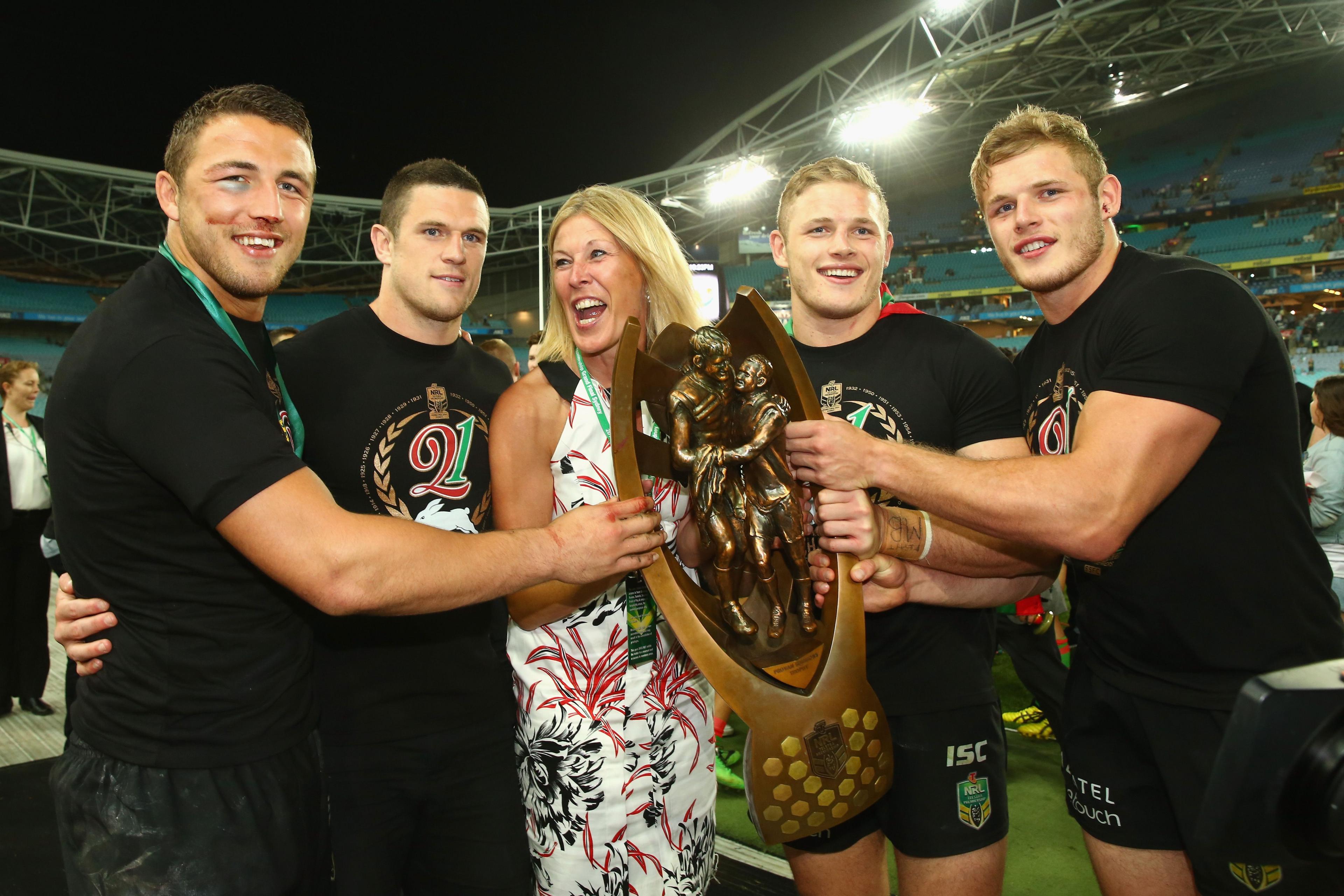 Sam Burgess, Luke Burgess, Julie Burgess the mother and George & Tom shared the celebrations with the NRL trophy