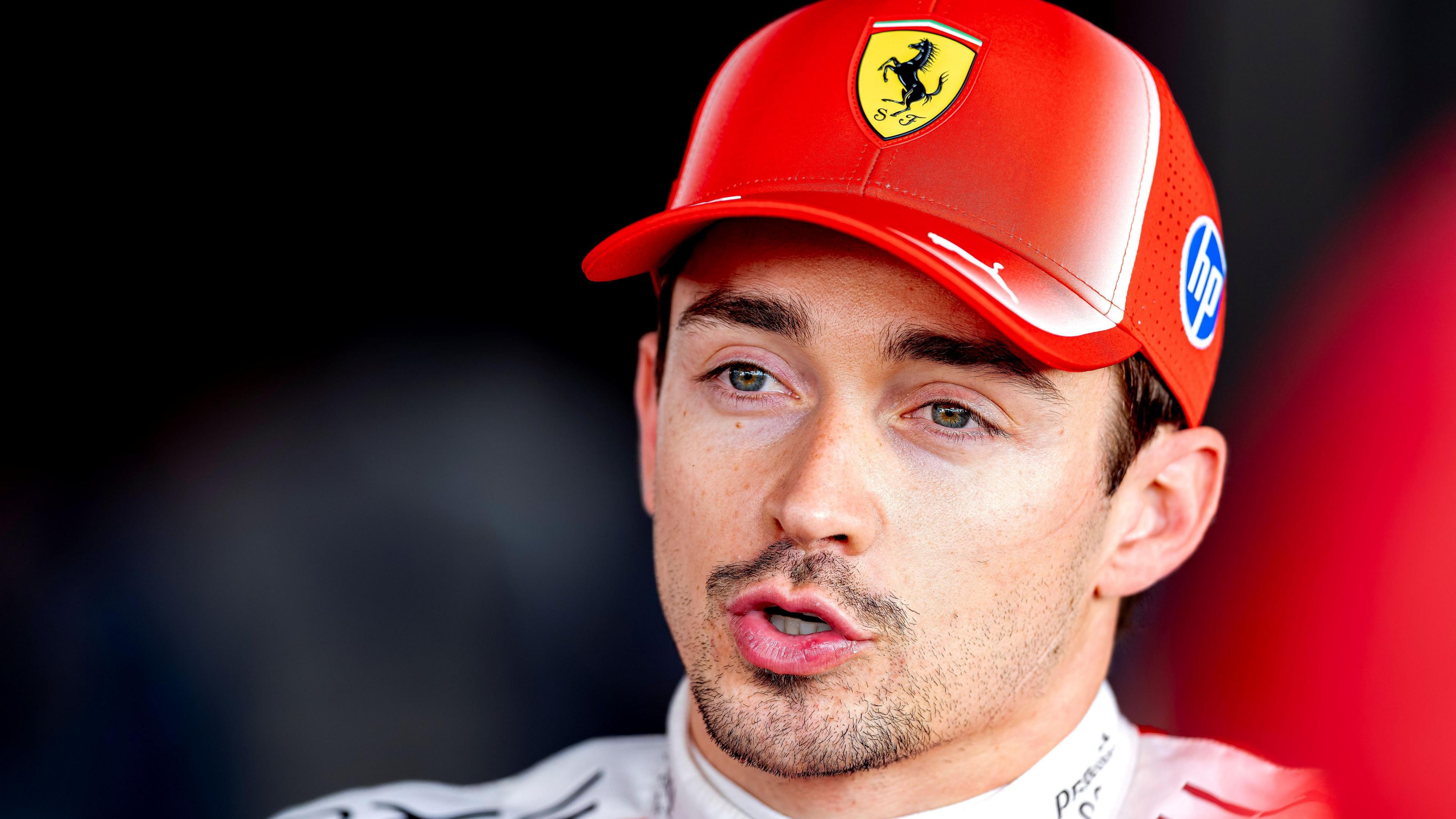 Ferrari's Charles Leclerc conducting media interviews after qualifying for the Japanese Grand Prix
