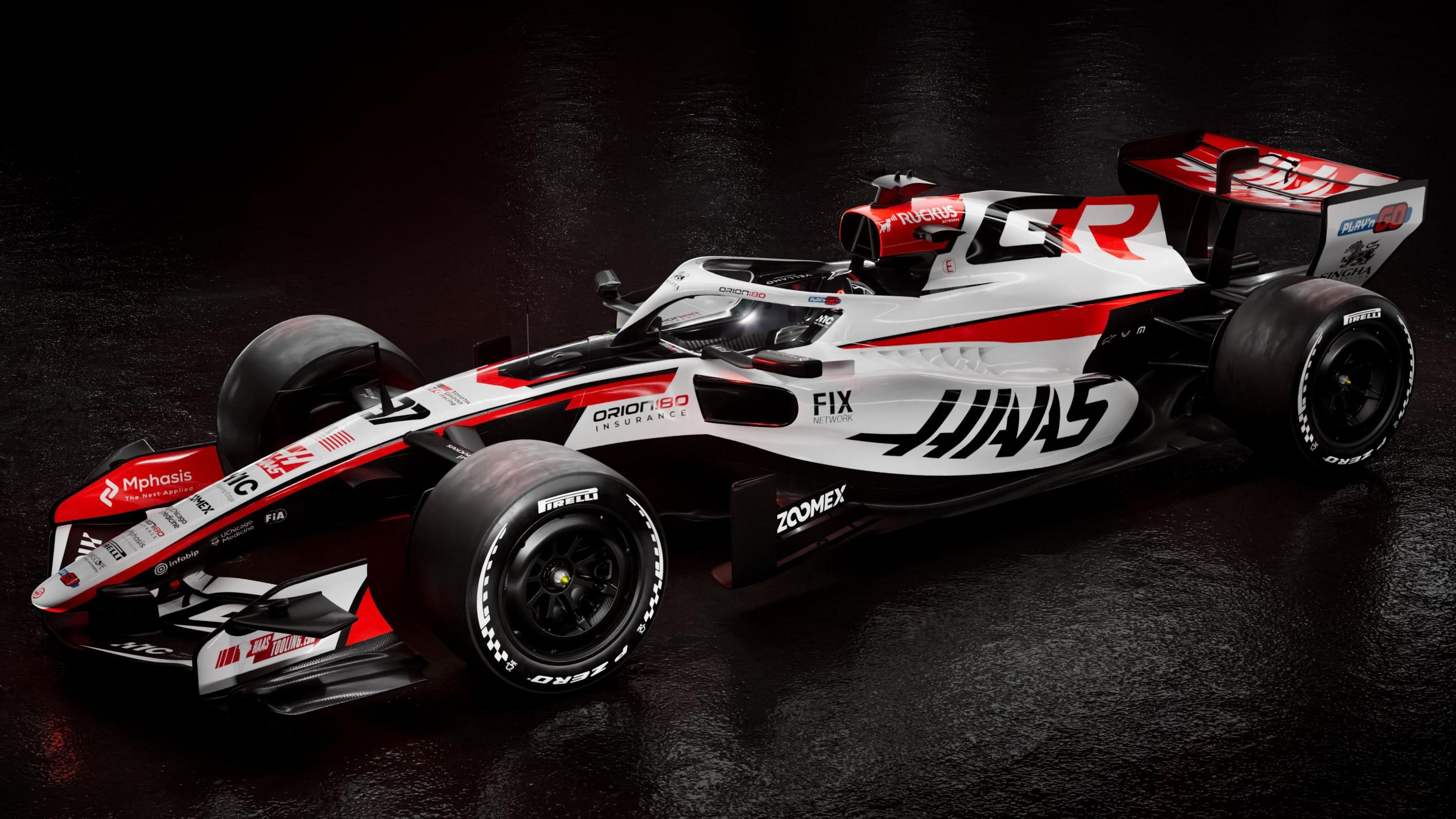 Digital render of the Haas VF26 Formula 1 car featuring a narrower front wing and engine cover fin.