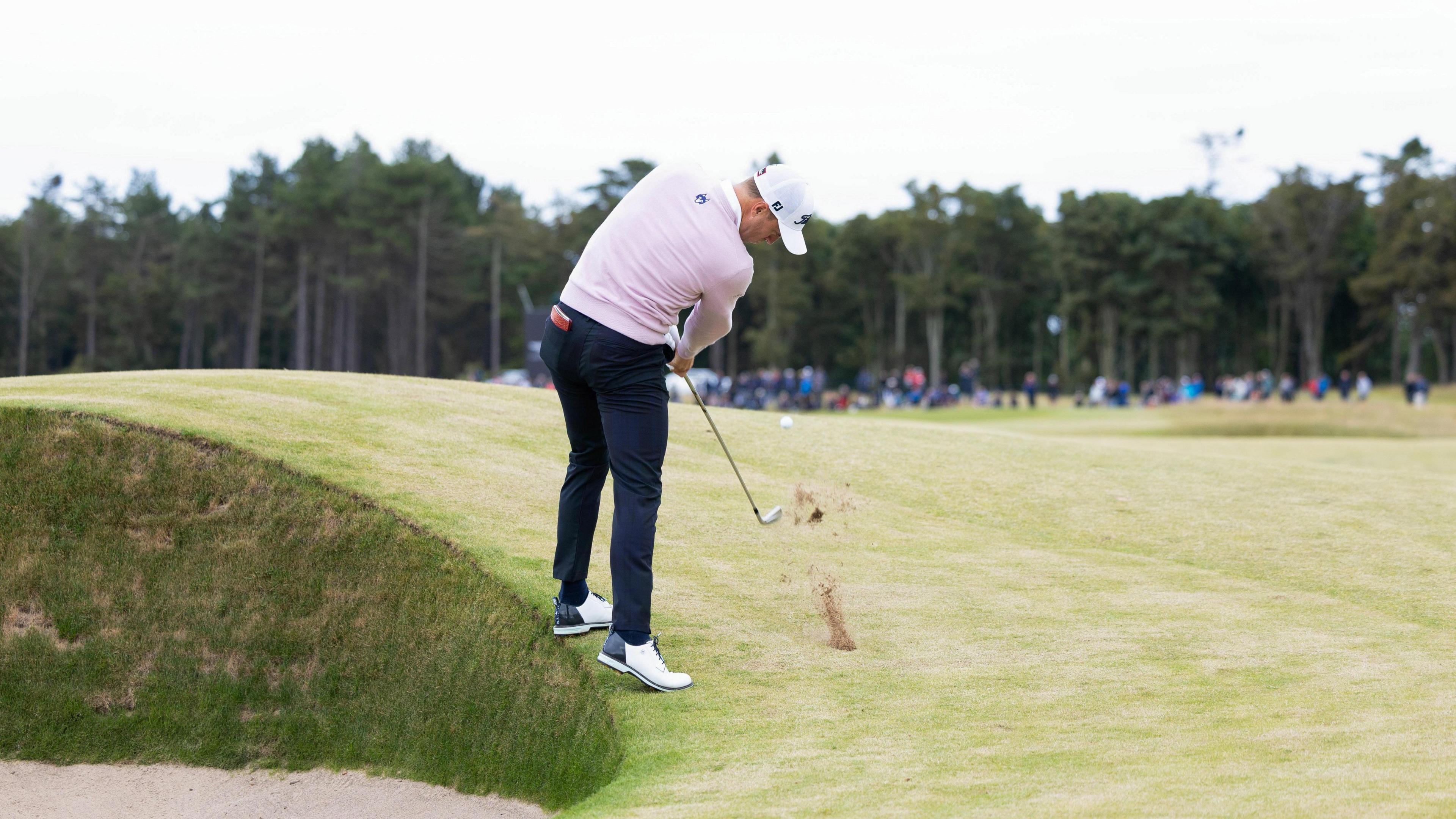 America's Justin Thomas leads by one after taking advantage of the benign conditions at the Renaissance Club