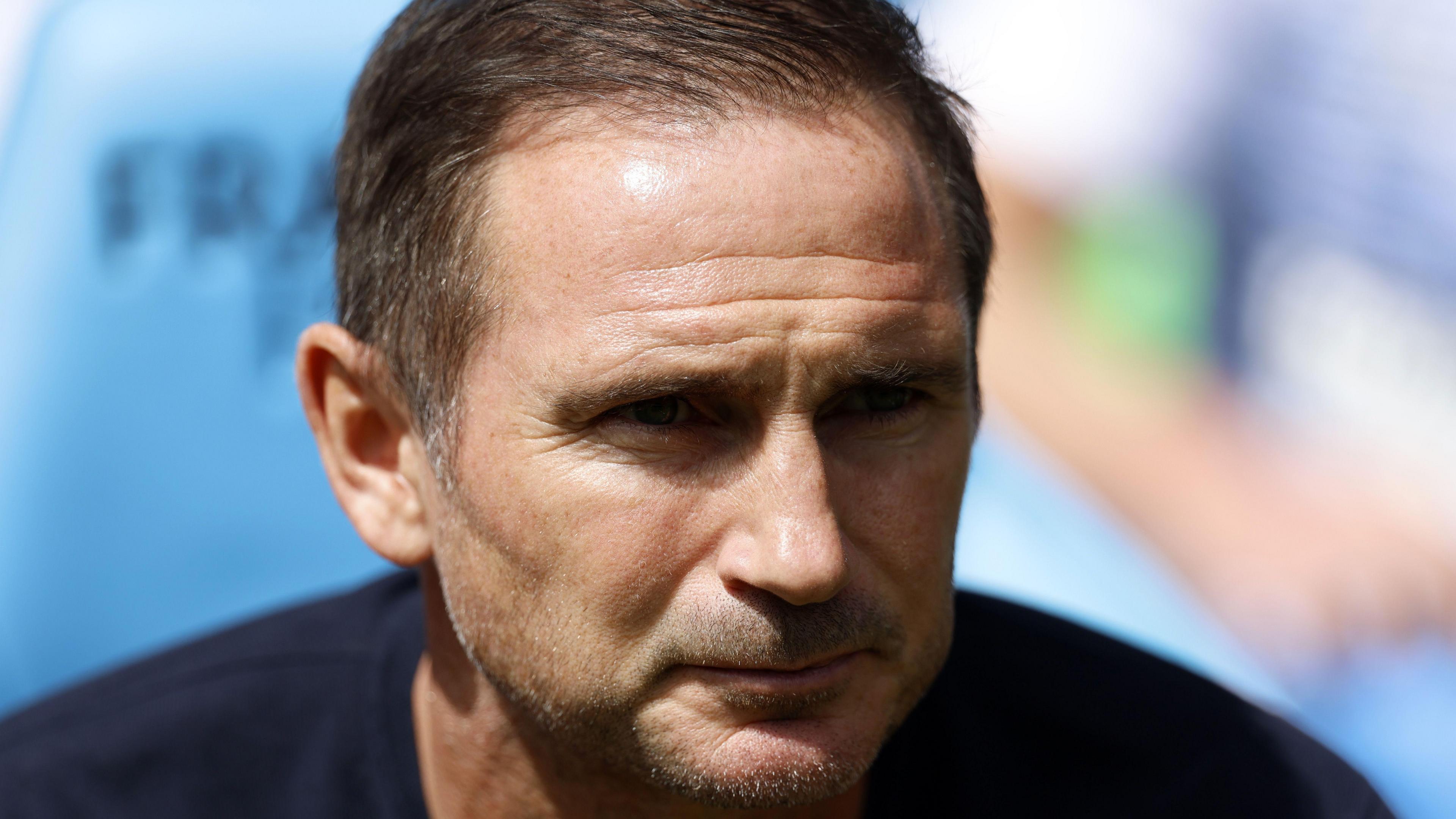 A headshot of Frank Lampard watching Coventry v Hull while sat in the dugout
