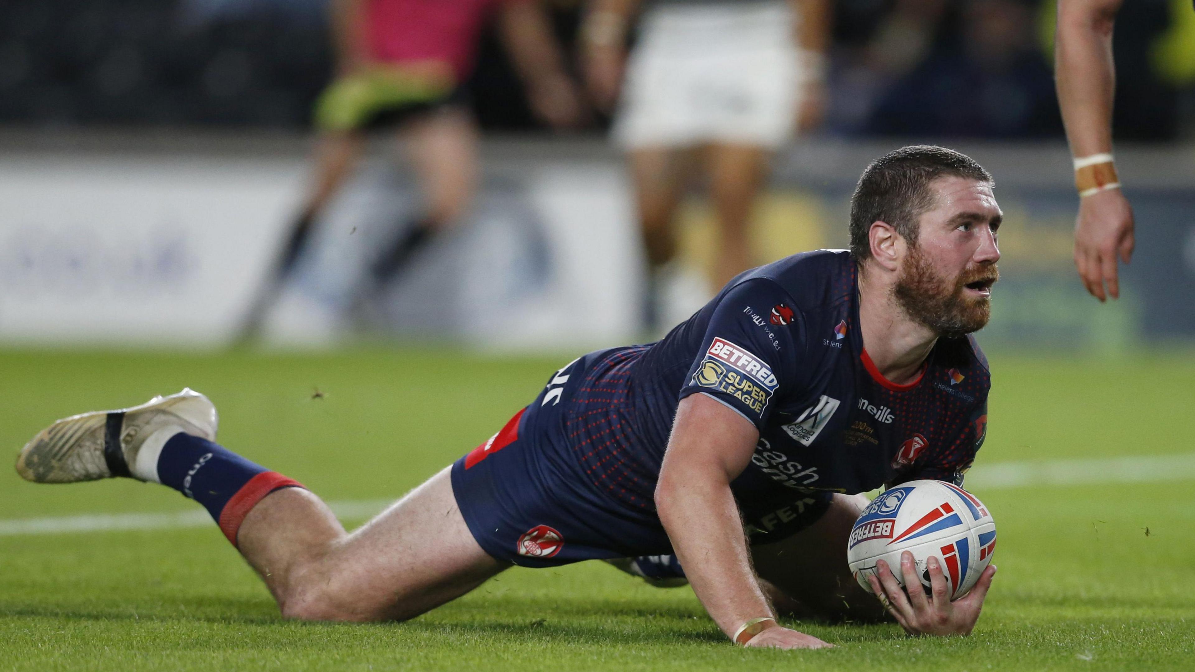 Kyle Amor scoring a try for St Helens in 2021