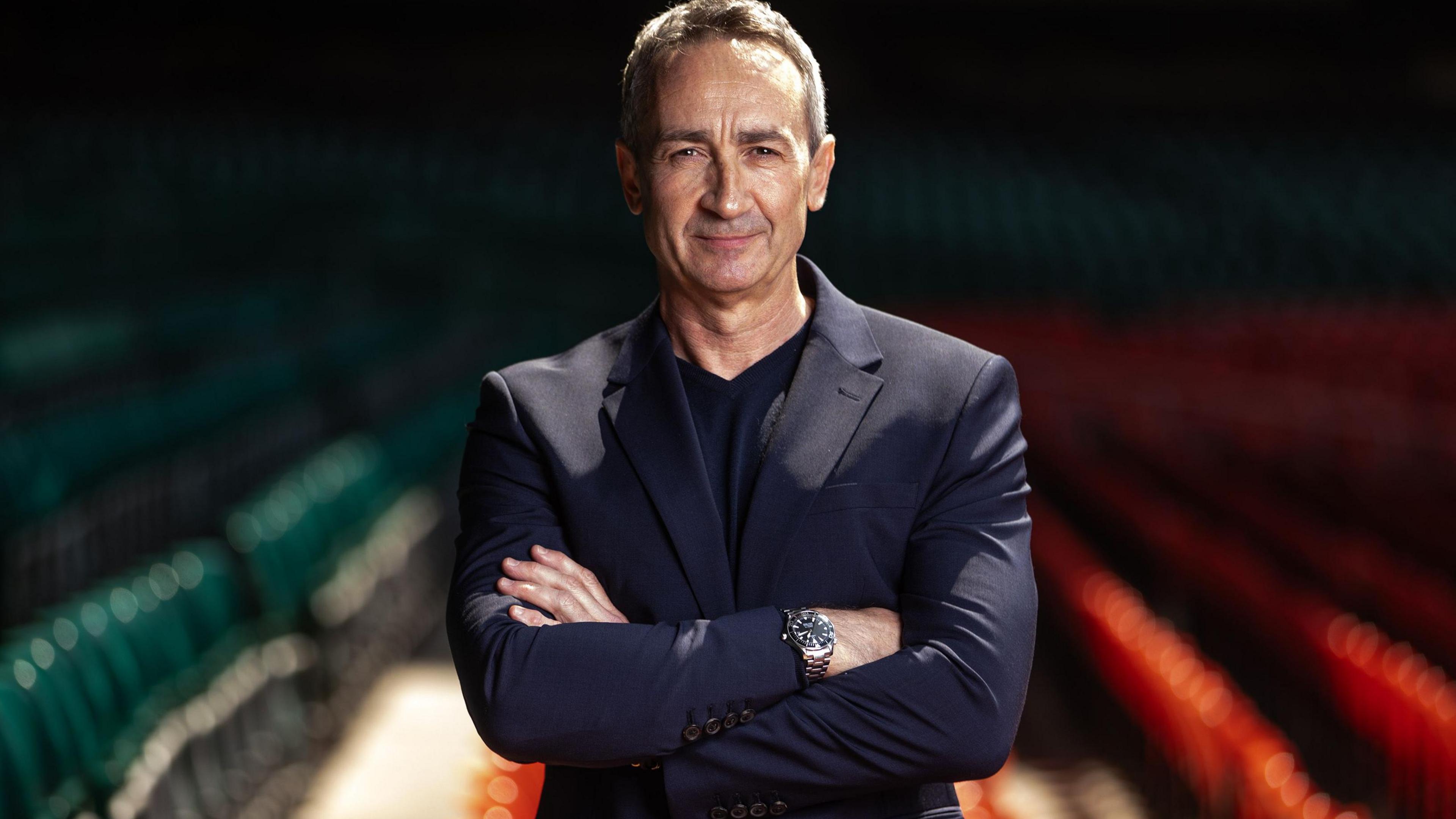 Dave Reddin with his arms folded