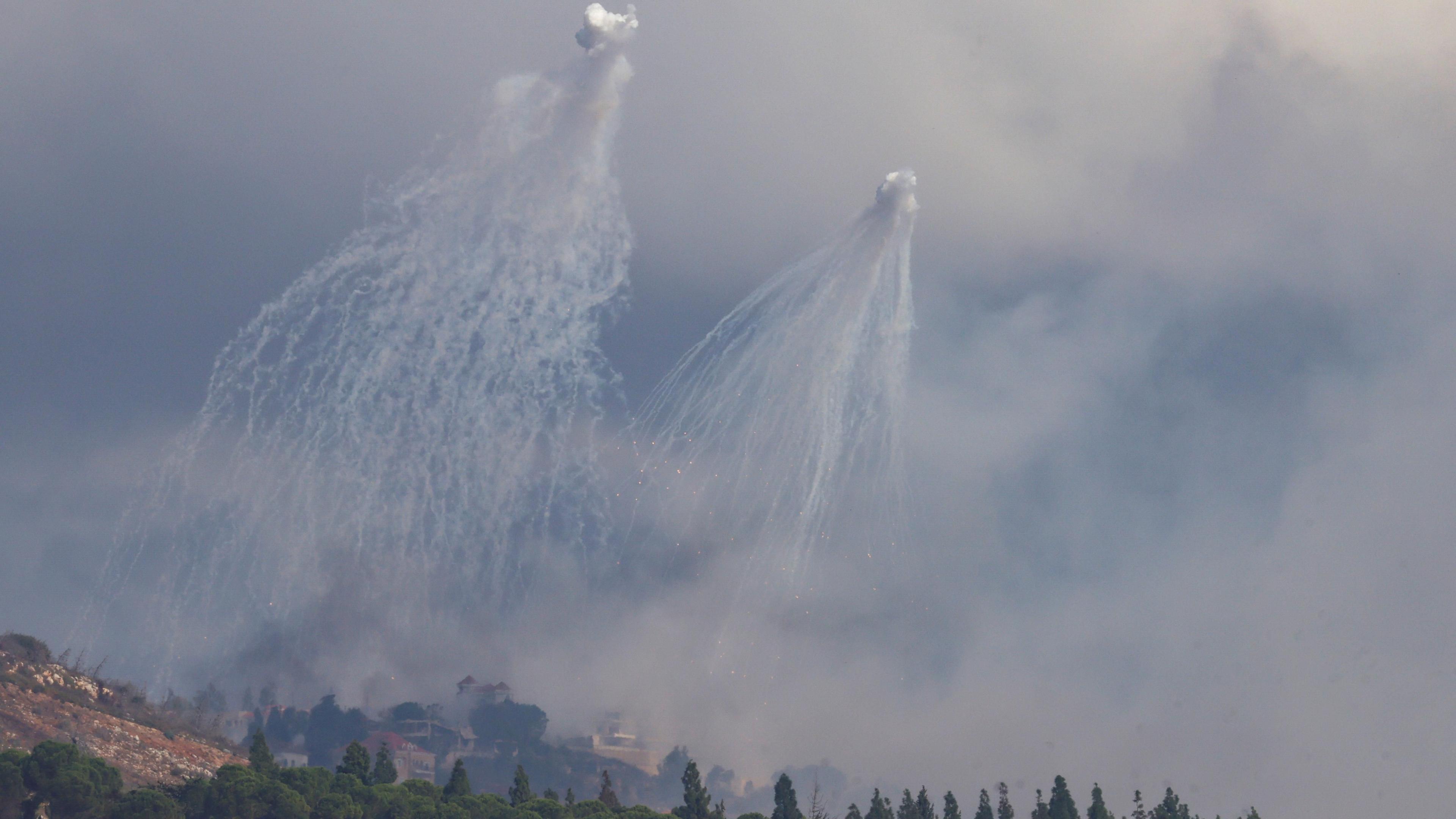 Structures in southern Lebanon are hit by Israeli artillery fire, as seen from Kiryat Shmona, northern Israel (1 October 2024)